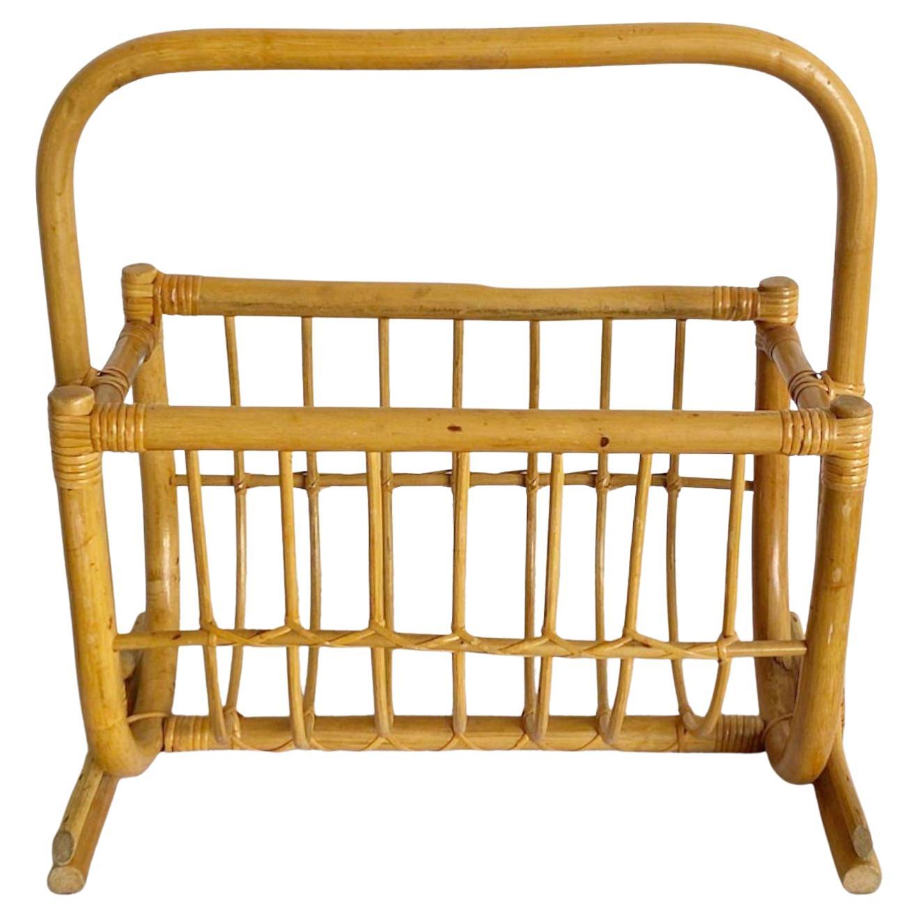 Exceptional vintage bohemian magazine rack. Features a fantastic bamboo and rattan construction.
