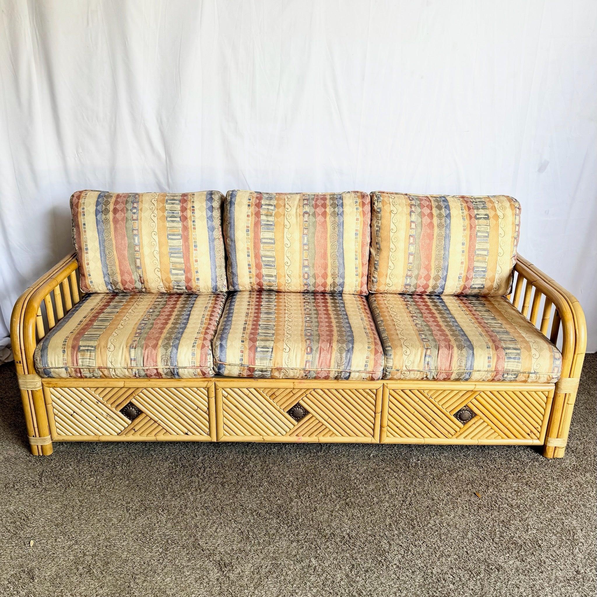 Boho Rattan Sofa With Pull-out Bed—bamboo frame, queen sleeper, vintage striped cushions—versatile and charming for boho lounges or guest rooms.
 

 We sell items as acquired, without restoring or repairing. Vintage pieces may have age-related wear.