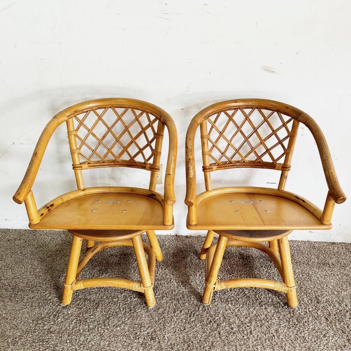 Boho Chic Bamboo Rattan Swivel Dining Arm Chairs by Ficks Reed In Good Condition For Sale In Delray Beach, FL