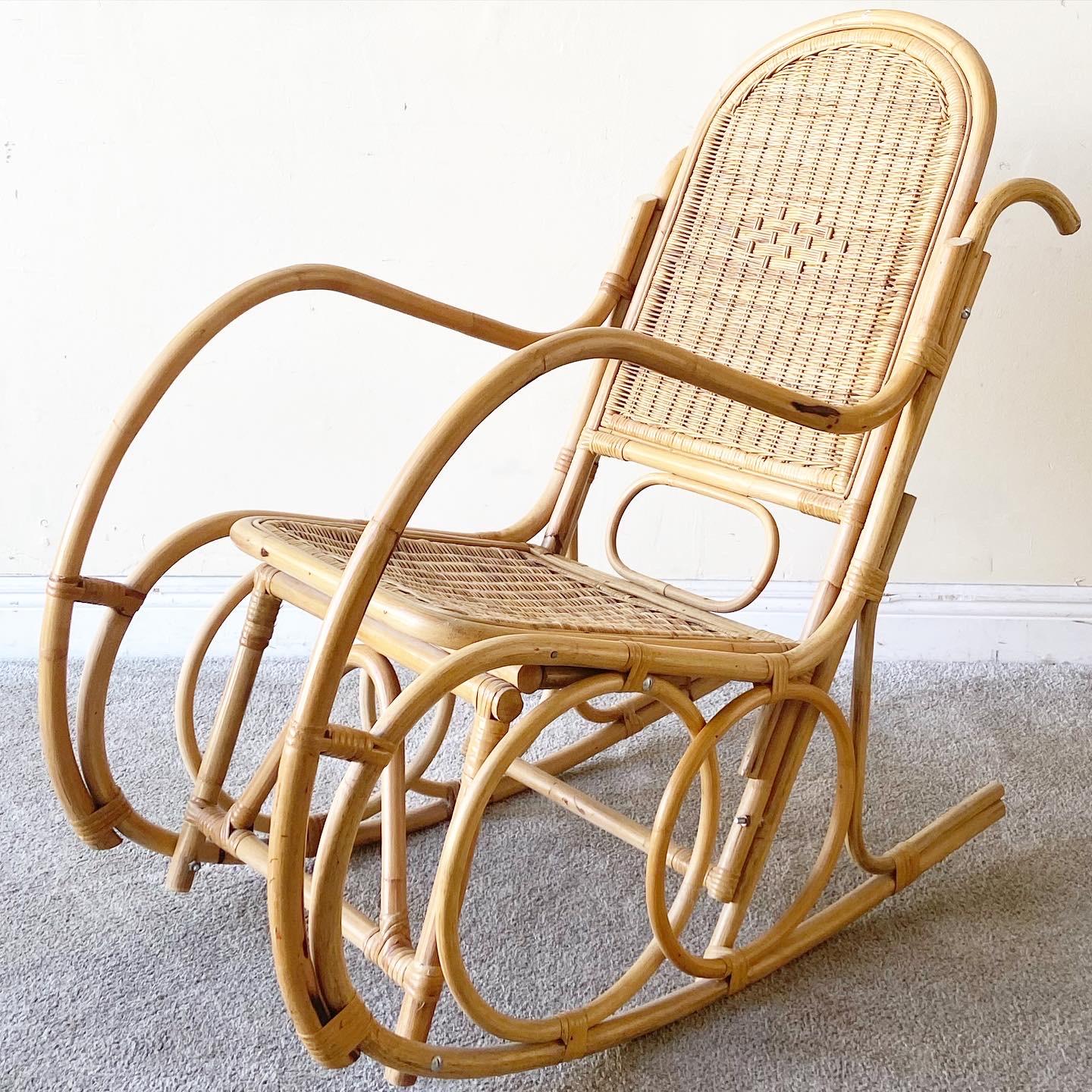 Amazing bamboo wicker rocking chair.

Additional Information:
Material: Bamboo, Rattan, Wicker
Color: Brown
Style: Boho Chic
Time Period: 1980s
Place of origin: Taiwan
Dimension: 20.5ʺ W × 36ʺ D × 37.5ʺ H