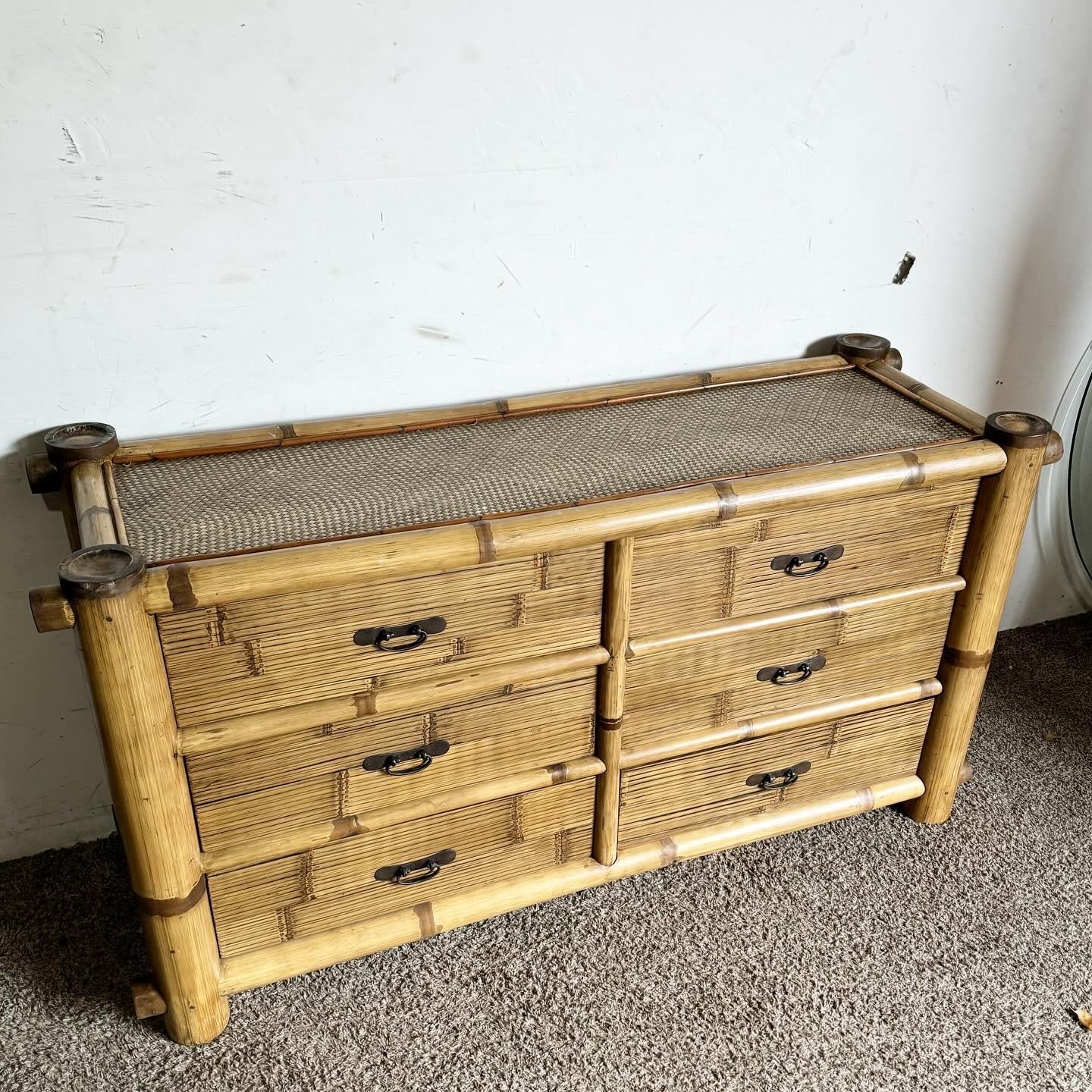Introduce the essence of bohemian style to your space with this Boho Chic Bamboo Woven Dresser. Crafted from sustainable bamboo with six drawers featuring woven accents, this dresser combines functionality with a relaxed, artistic vibe. The