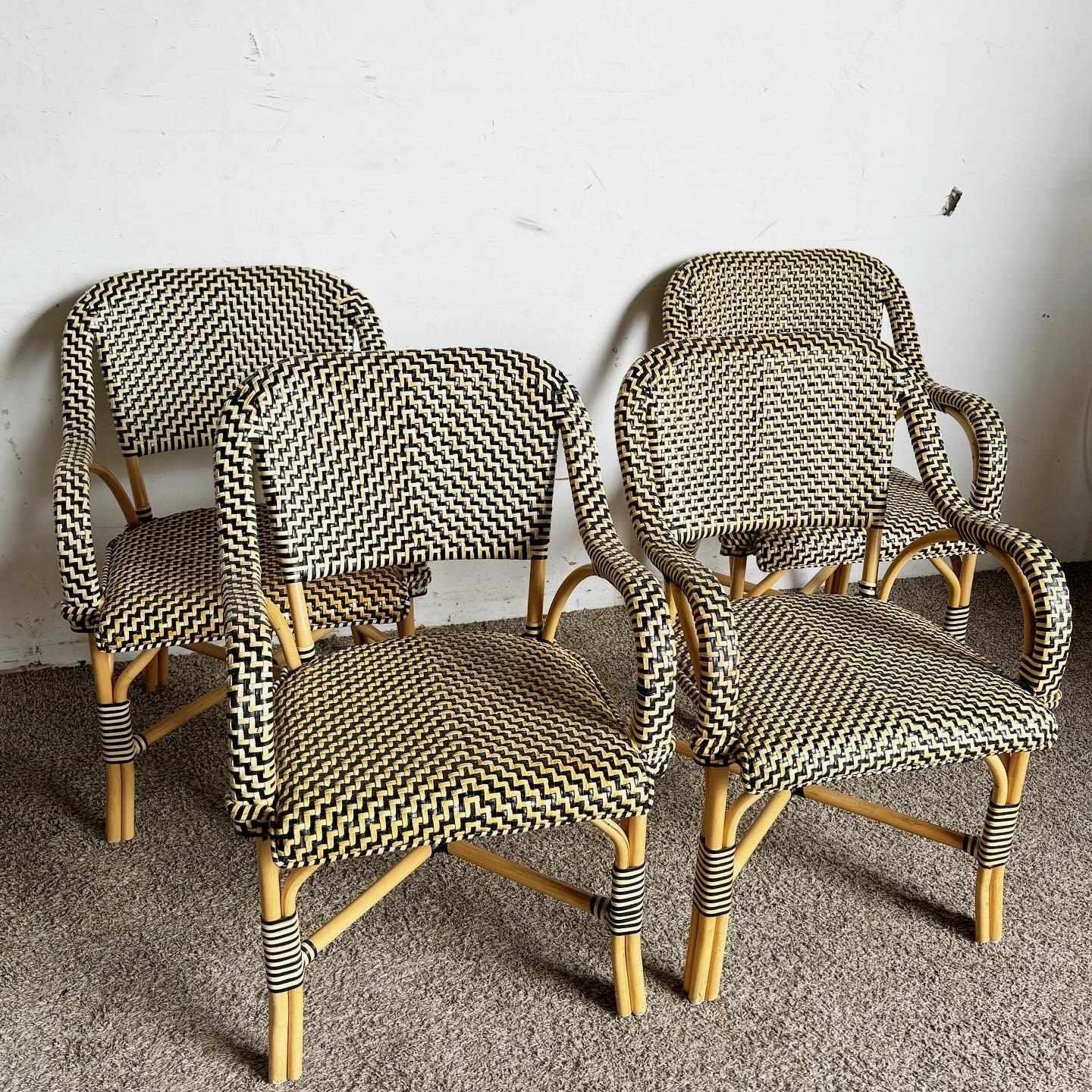 Introduce a touch of earthy sophistication to your dining space with this set of four Boho Chic Bent Wood and Woven Leather Dining Arm Chairs. Merging the warmth of wood with elegant woven leather, these chairs offer comfort and style, perfect for