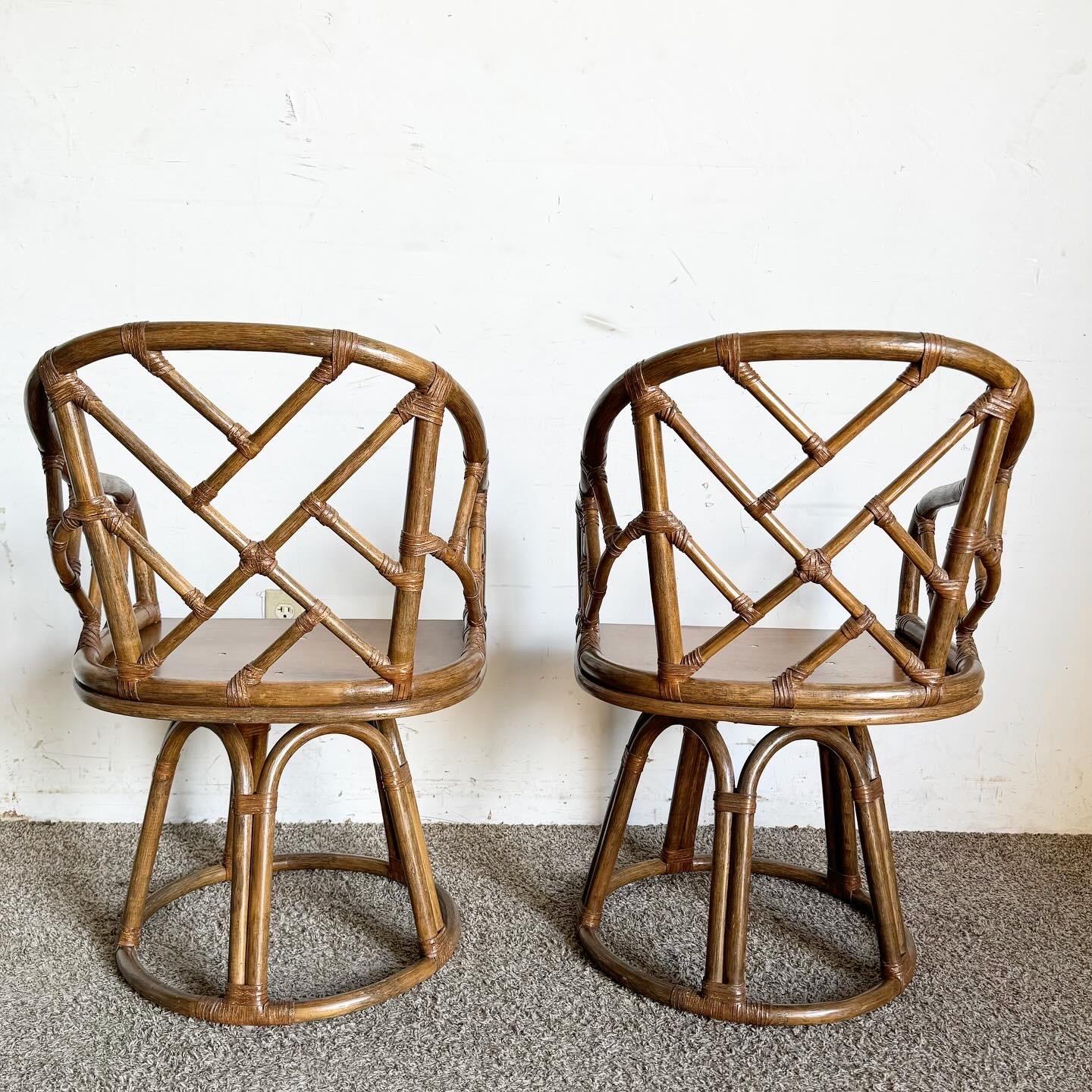 Late 20th Century Boho Chic Chippendale Style Bamboo Rattan Swivel Arm Dining Chairs - Set of 4