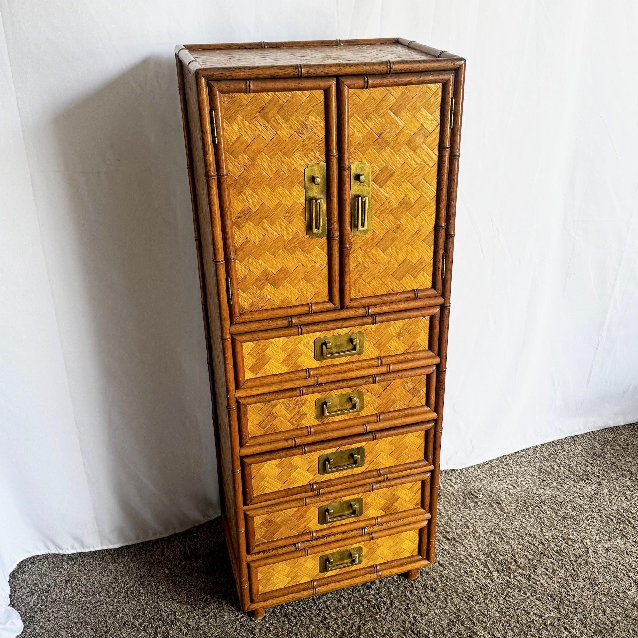 Boho Chic Faux Bamboo Armoire—herringbone wicker facade with sculpted faux bamboo framing offers coastal elegance and ample storage.
 
 Minor wear around the edges as shown in the photos. 
 
 We sell items as acquired, without restoring or