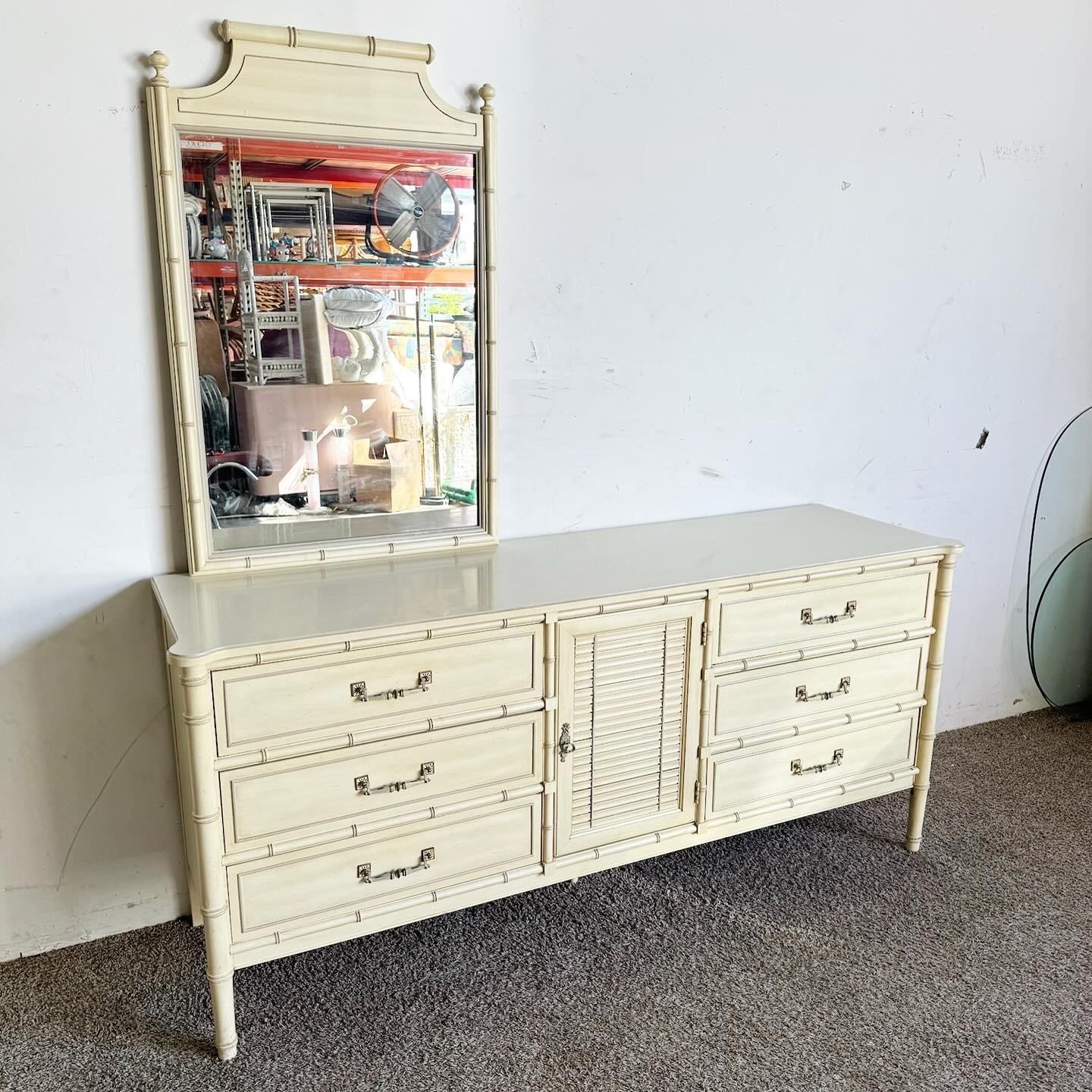 Discover the tropical allure of the Boho Chic Faux Bamboo ‚ÄúBali Hai‚Äù Dresser by Henry Link, accompanied by a matching mirror. Featuring faux bamboo detailing and spacious drawers, this set combines bohemian charm with classic sophistication. The