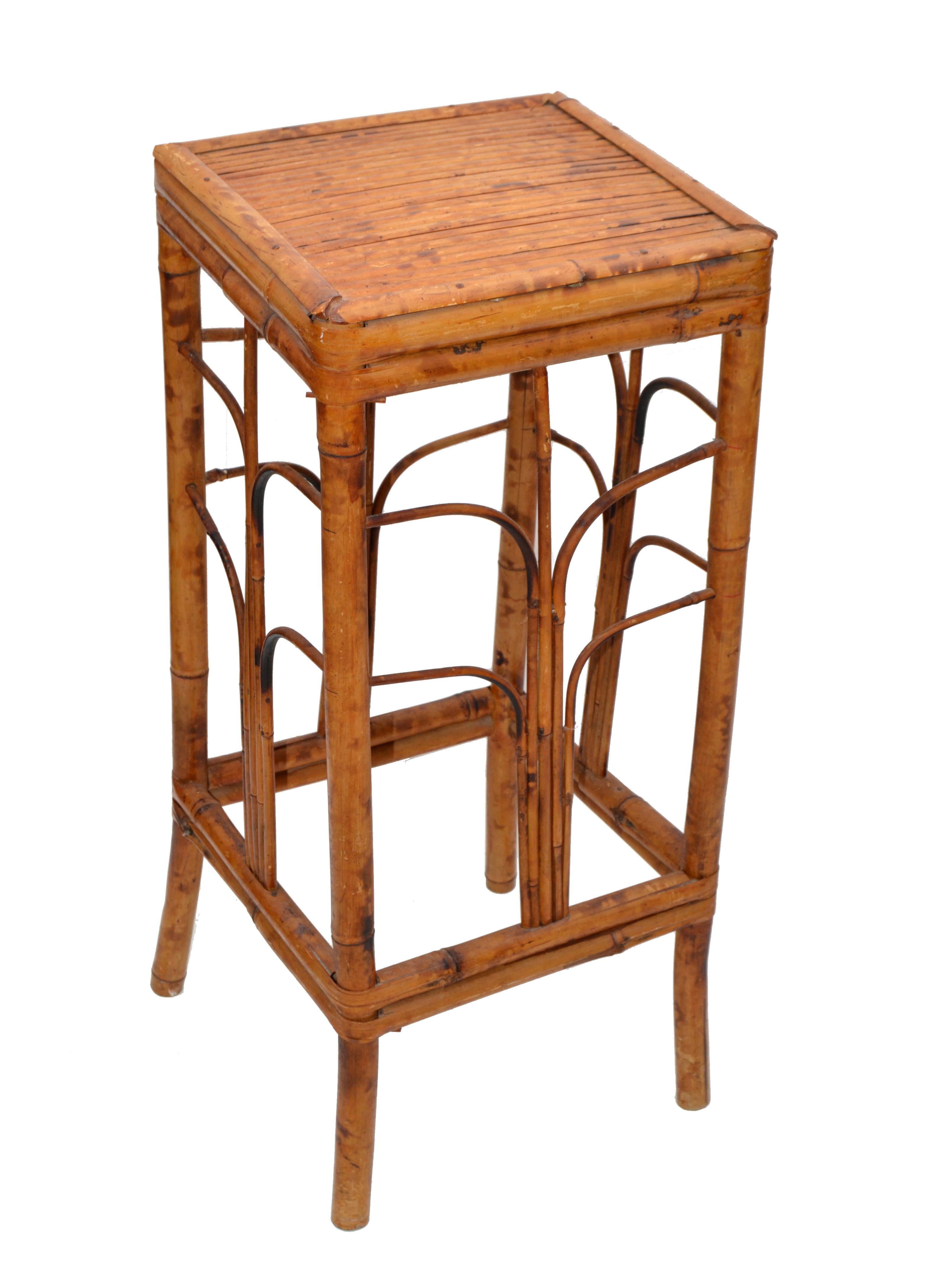 Decorative handcrafted and handwoven Bohemian style Mid-Century Modern bamboo and rattan side table and plant stand.
Great for your Florida style sunroom or porch.