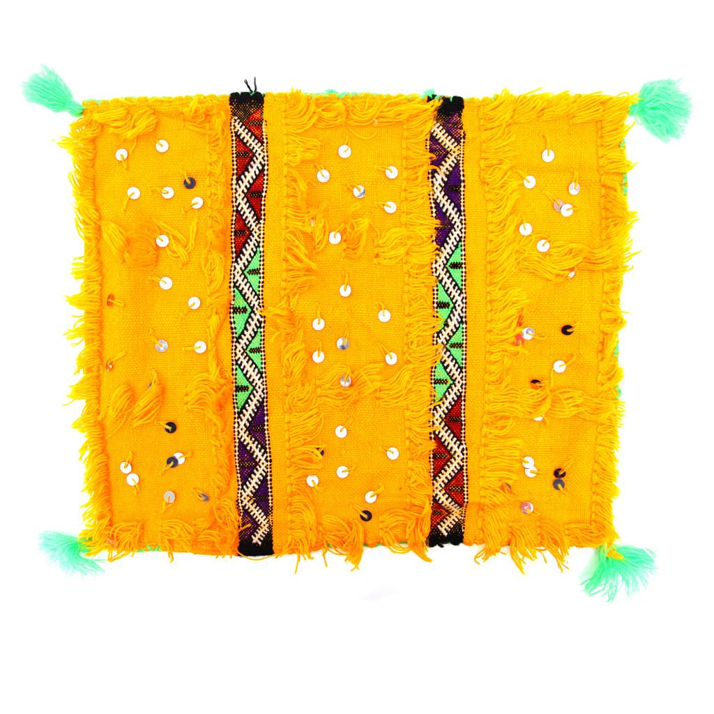 A versatile pair of  Moroccan Boho Chic pillow cases in a vibrant yellow color.  Finely hand-made of locally source soft wool, the pillow cases are embellished with sequin accents and fringed edges and has a geometrical design bands adding a touch