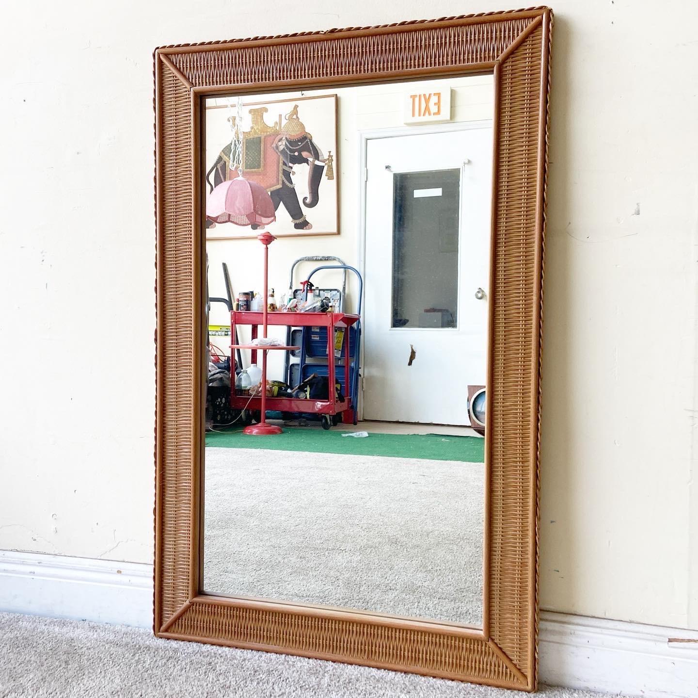 Exceptional wicker framed mirrors by Lexington. Features a woven wicker along the edges of both mirrors.
 