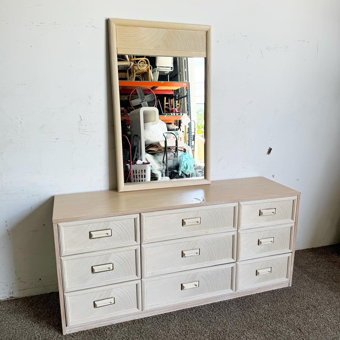 Enhance your bedroom decor with this stunning Boho Chic Pencil Reed Dresser with Mirror by Henry Link for Lexington. Crafted in the 1980s, this dresser features a distinctive pencil reed design with eight spacious drawers and a matching mirror. The