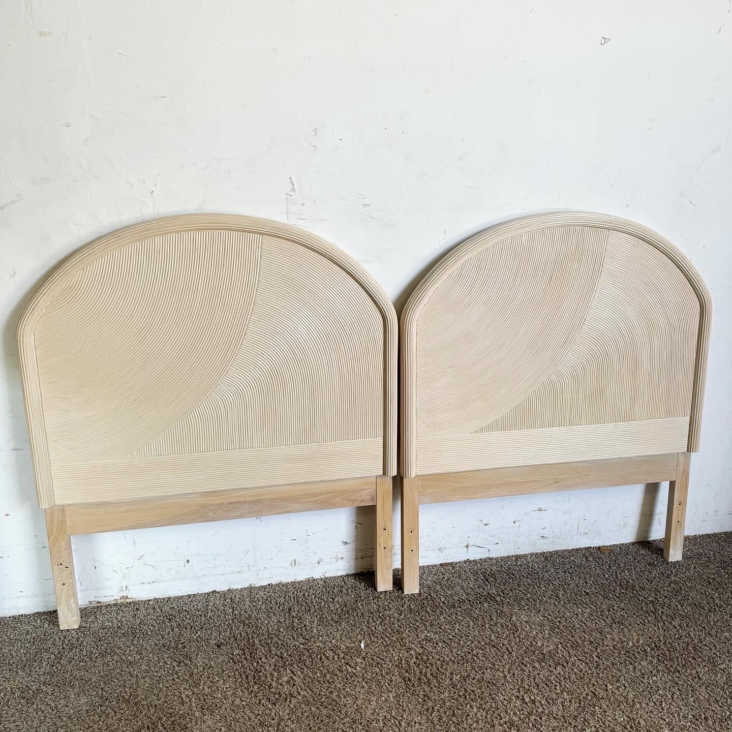 Add a touch of Boho chic to your bedroom with these Boho Chic Pencil Reed Twin Headboards by Henry Link for Lexington. Crafted in the 1980s, they feature a distinctive pencil reed design with intricate patterns and a light, natural finish. Perfect