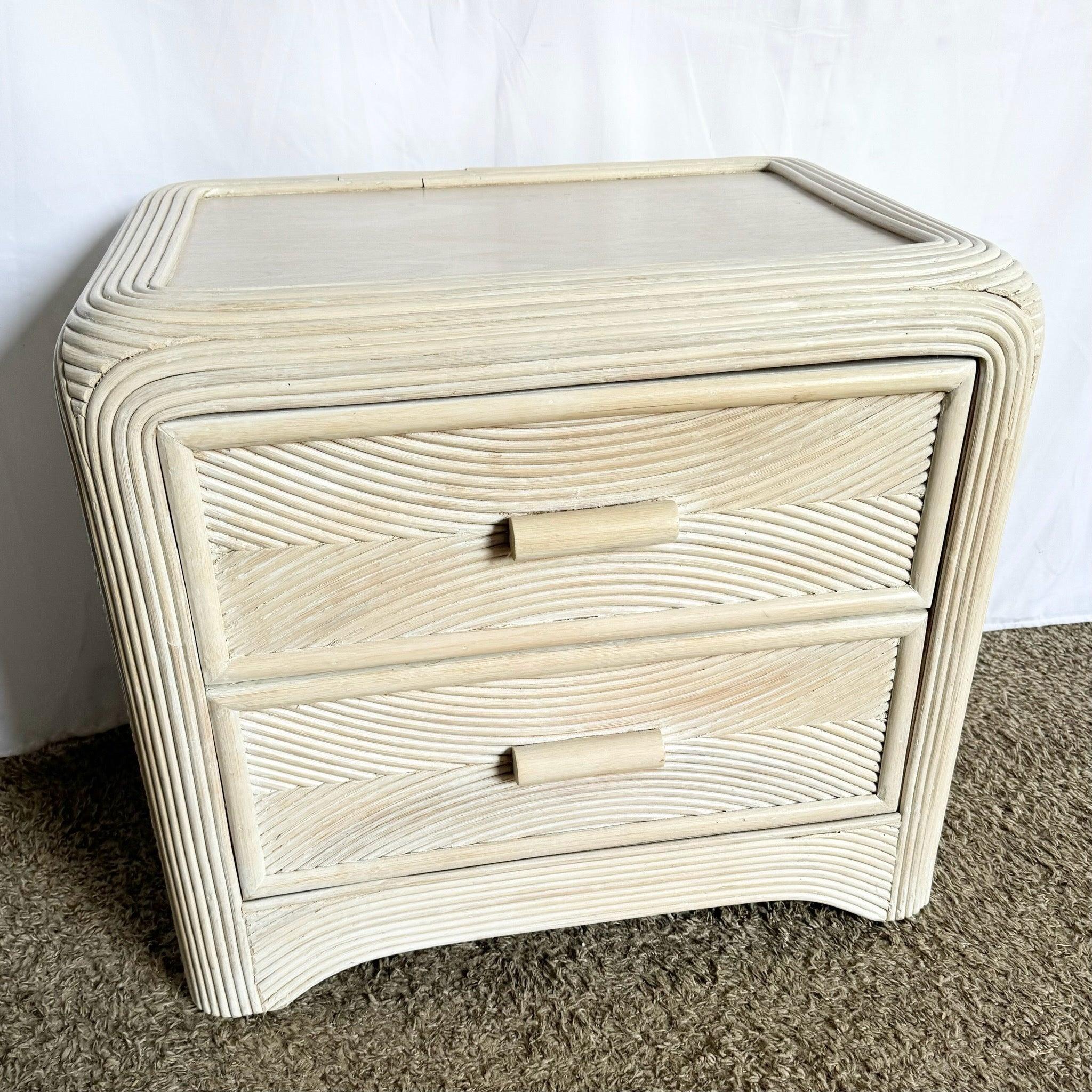Boho Chic Pencil Reed Nightstand with glass top and two drawers—adds natural elegance to bohemian-inspired interiors.​
 
 We sell items as acquired, without restoring or repairing. Vintage pieces may have age-related wear. Review photos carefully,