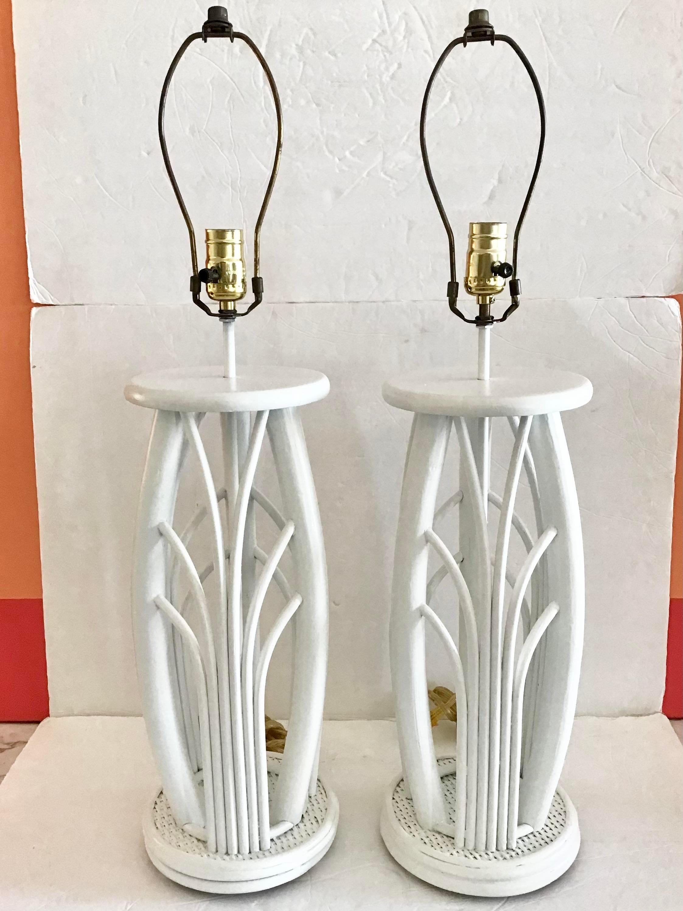 Fabulous pair of freshly lacquered in white boho chic pencil reed table lamps. Nice pencil reed details. Add this pair to your boho chic inspired interiors. Does not include shades so add a pair of your choice.