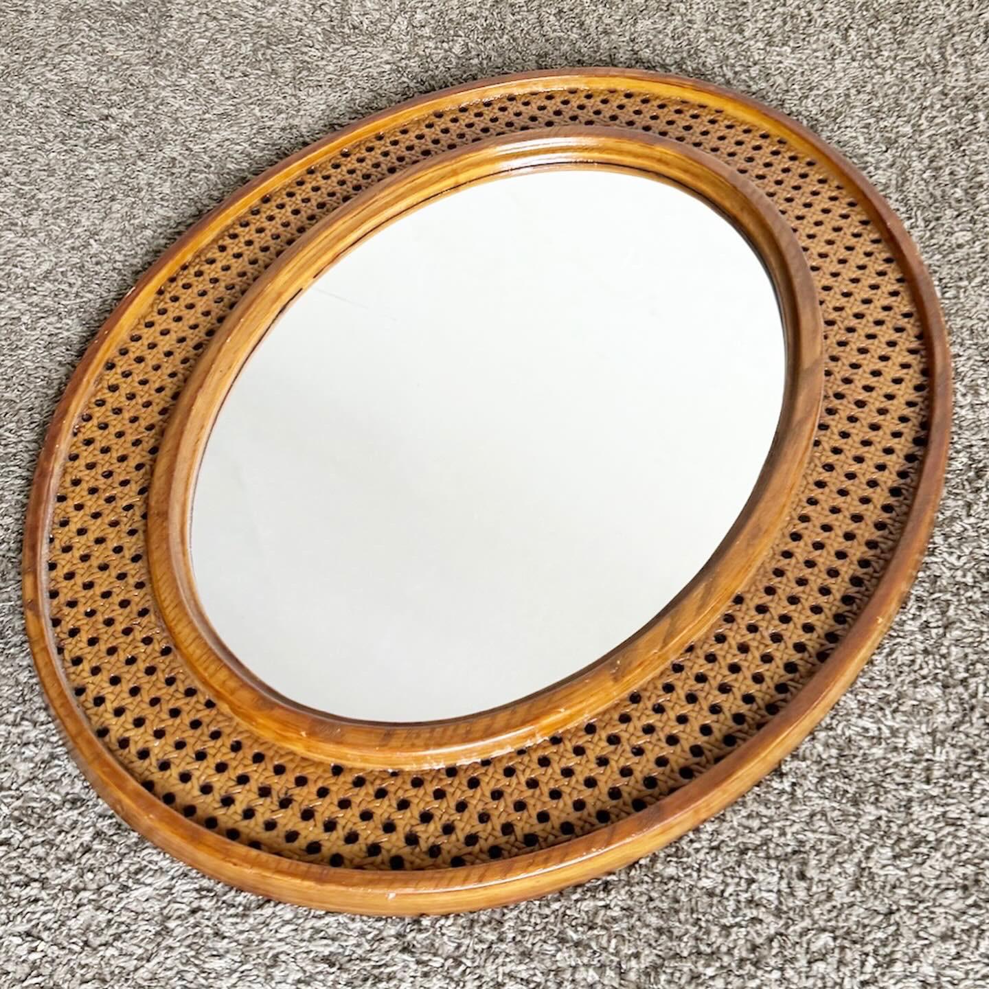 The Boho Chic Plastic Faux Cane Framed Wall Mirror combines modern materials with bohemian style. Its high-quality plastic frame, designed to resemble cane, adds rustic charm and warmth. The mirror provides a clear reflection, ideal for brightening