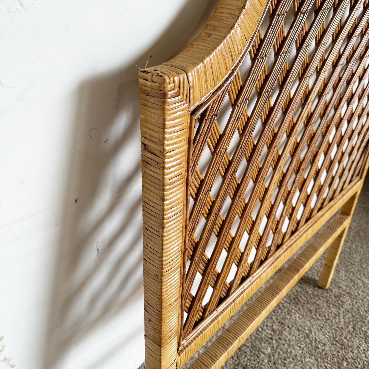 Embrace the natural elegance of the Boho Chic Rattan and Reed Twin Headboard. Crafted from a blend of rattan and reed, this headboard showcases organic textures and intricate weaving, embodying the relaxed sophistication of bohemian style. It's
