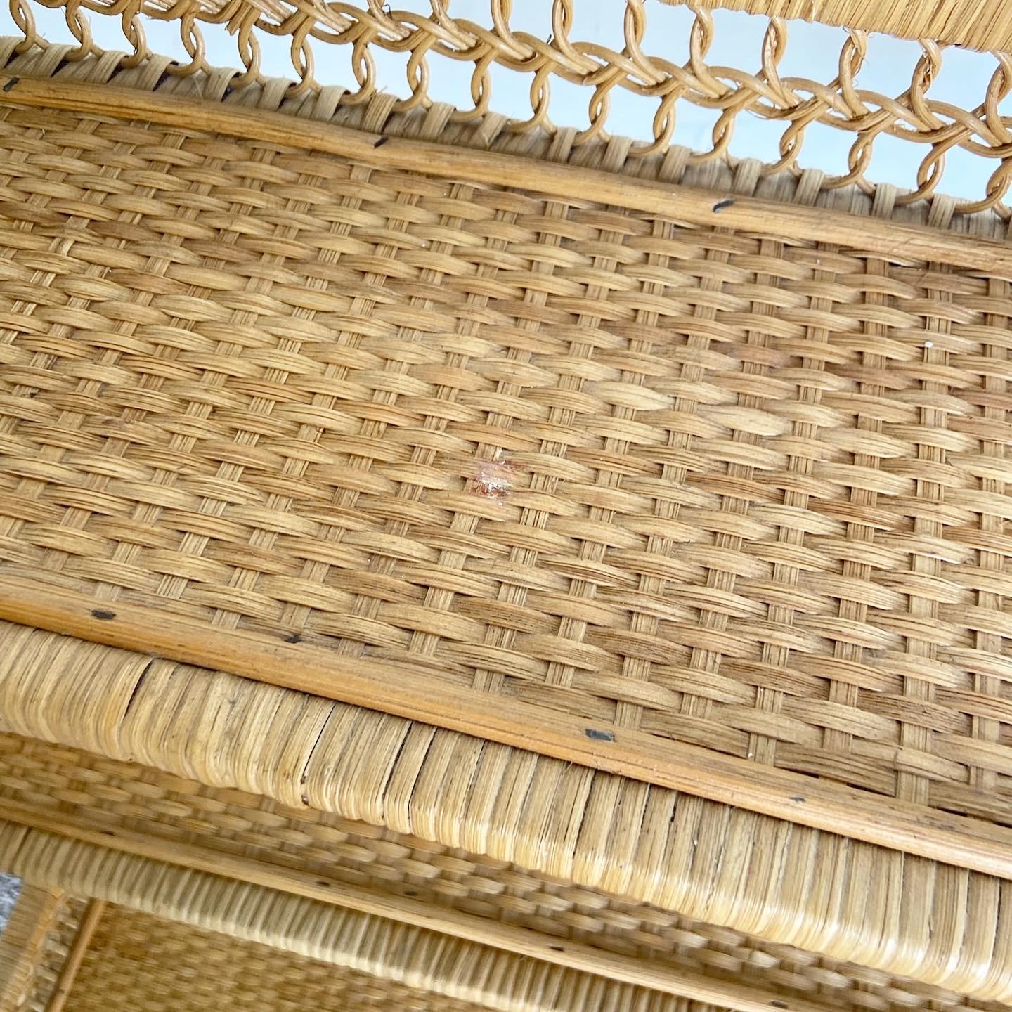 Wonderful vintage boho chic Etagere/bookcase. Features rattan wrapping throughout the frame with wicker weaving the surfaces.