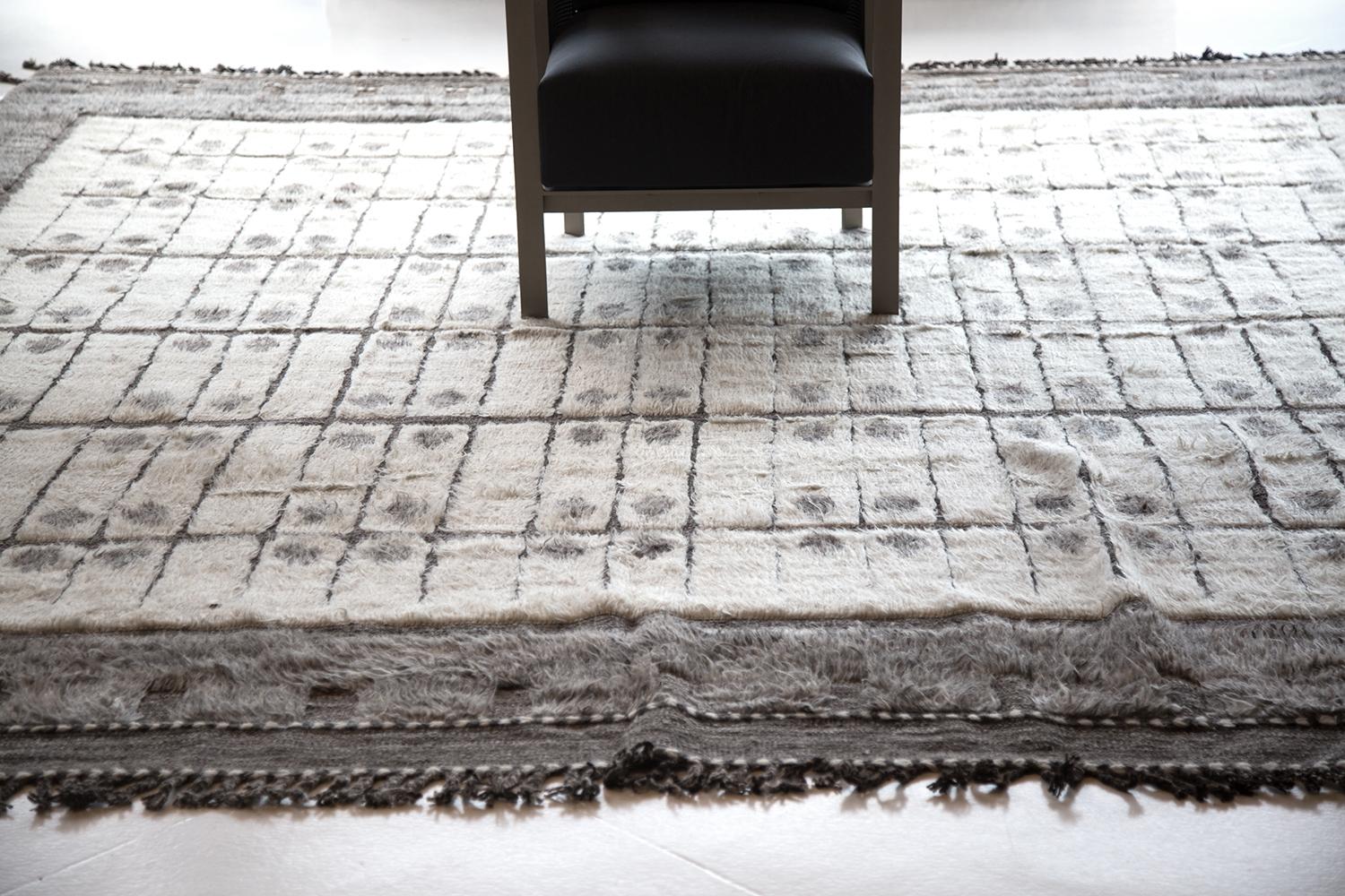 A beautiful and trendy modern Boho Chic rug, rug type / origin: Central Asian rug, date circa modern rug. Size: 11 ft. 5 in x 12 ft. 7 in (3.48 m x 3.84 m). 

This carpet has a warm and luxurious feel. It has a design that is both modern and that