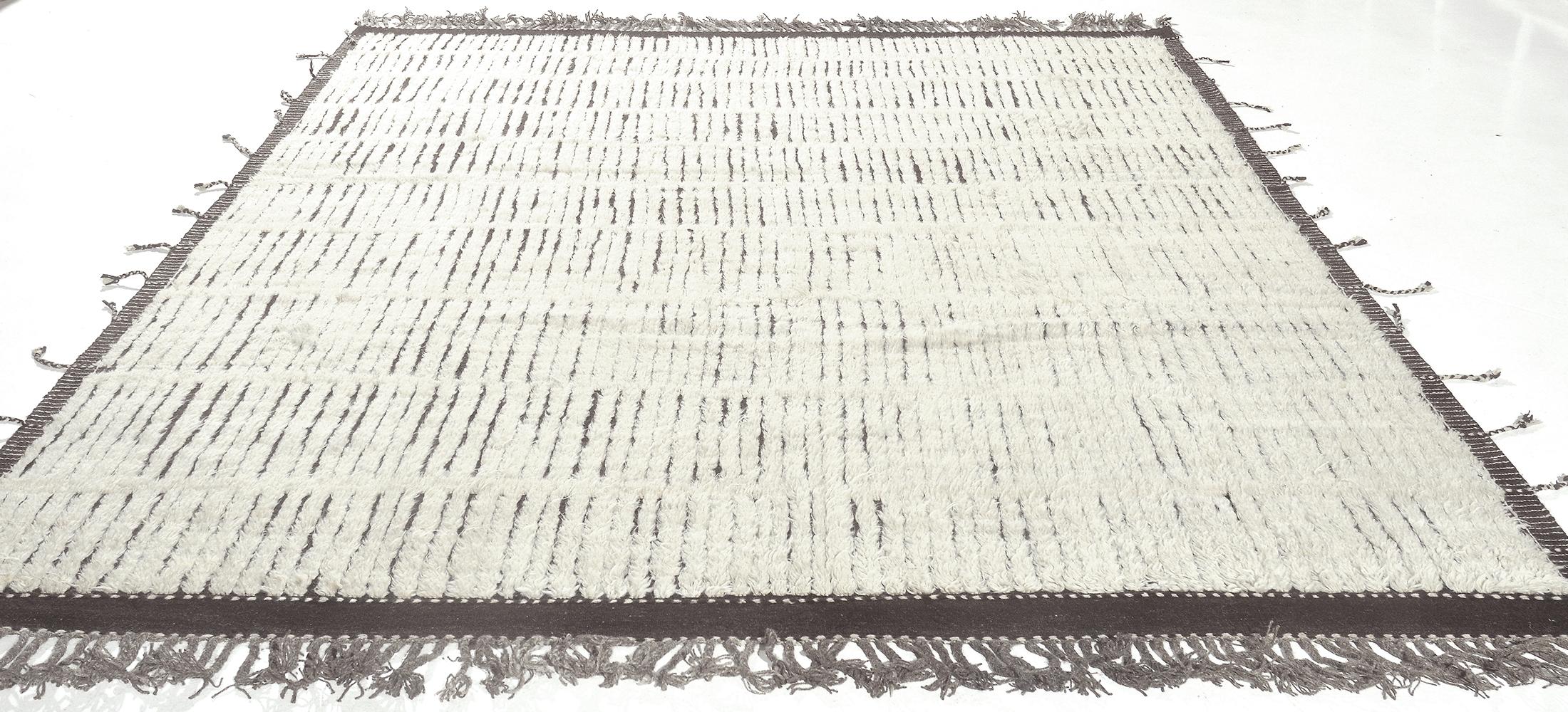 A beautiful and trendy modern Boho Chic rug, rug type / origin: Central Asian rug, circa modern rug. Size: 8 ft. 3 in x 10 ft. 5 in (2.51 m x 3.18 m).

Bold chocolate and ivory create a fresh and modern look that is a bit boho chic. The designer of