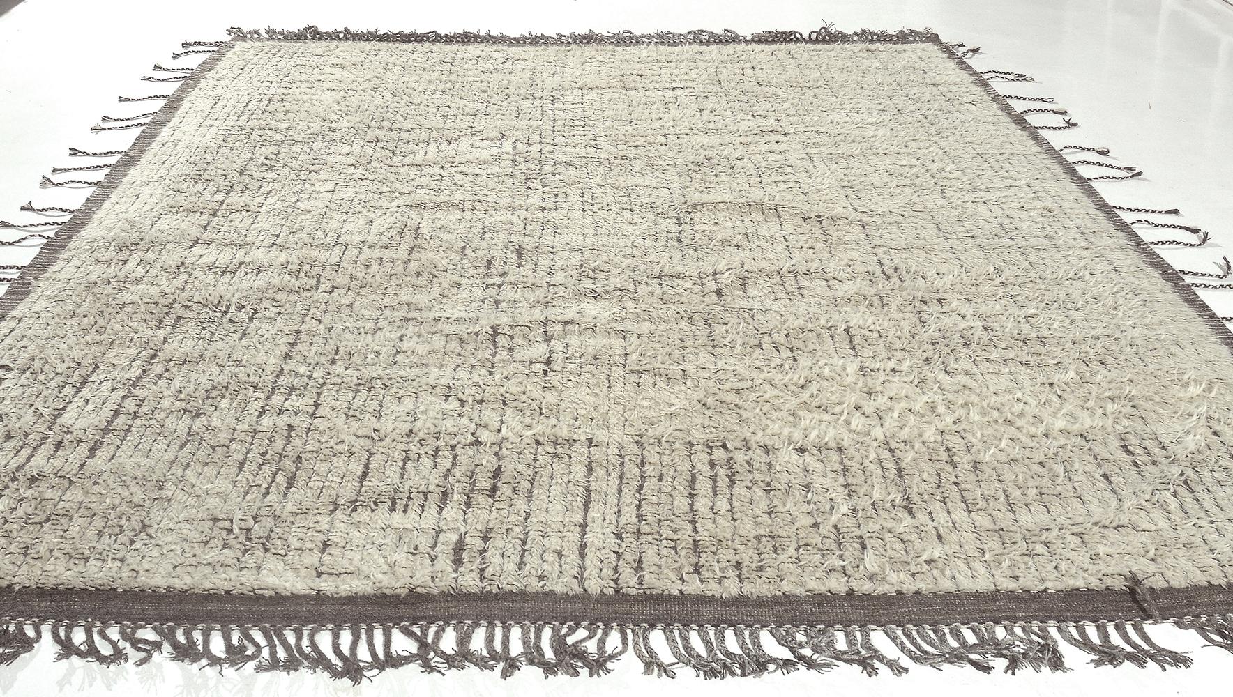 A beautiful and trendy modern Boho Chic rug, rug type / origin: Central Asian rug, date: circa modern rug. Size: 9 ft 3 in x 12 ft 1 in (2.82 m x 3.68 m)

This carpet has a lush pile and soft, neutral tones that will add warmth to both contemporary