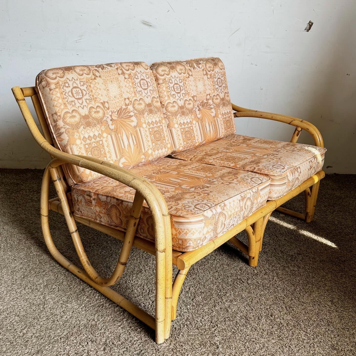 Late 20th Century Boho Chic Sculpted Bamboo Rattan Loveseat With Patterned Tufted Cushions For Sale