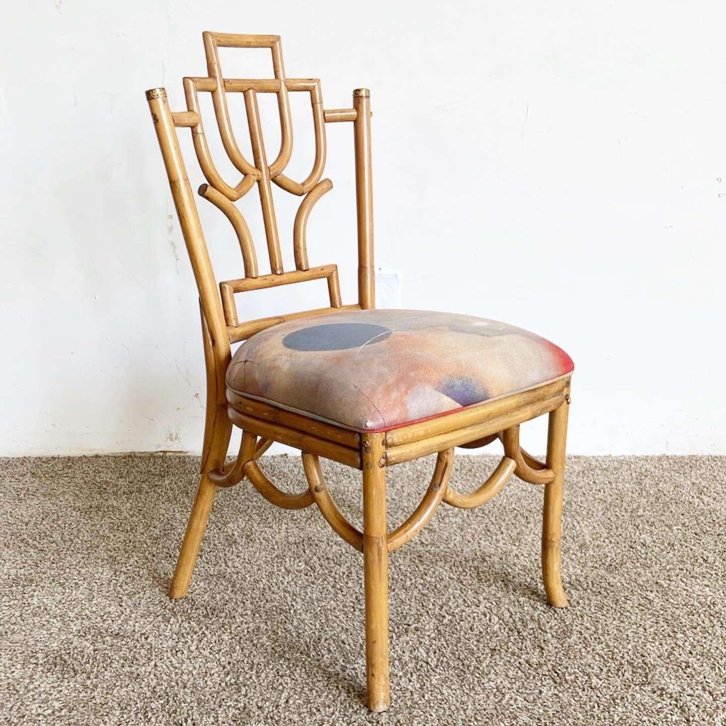 Exceptional vintage bohemian bamboo side chair. Features a fantastic back rest with brass accent tips.

Seat height is 19.25 in