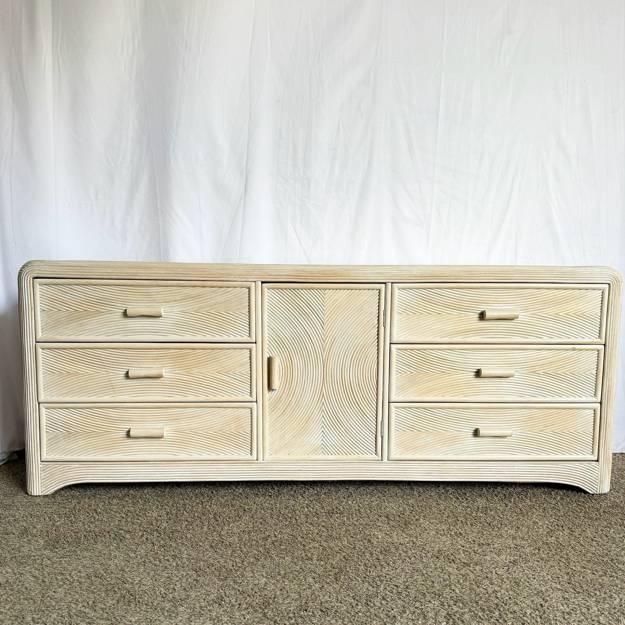 Boho Chic Sculpted Pencil Reed Dresser with natural texture and relaxed style—perfect for coastal, bohemian, or eclectic interiors.
 
 Some wear to the surfaces and edges as shown in the photos. 
 
 We sell items as acquired, without restoring or