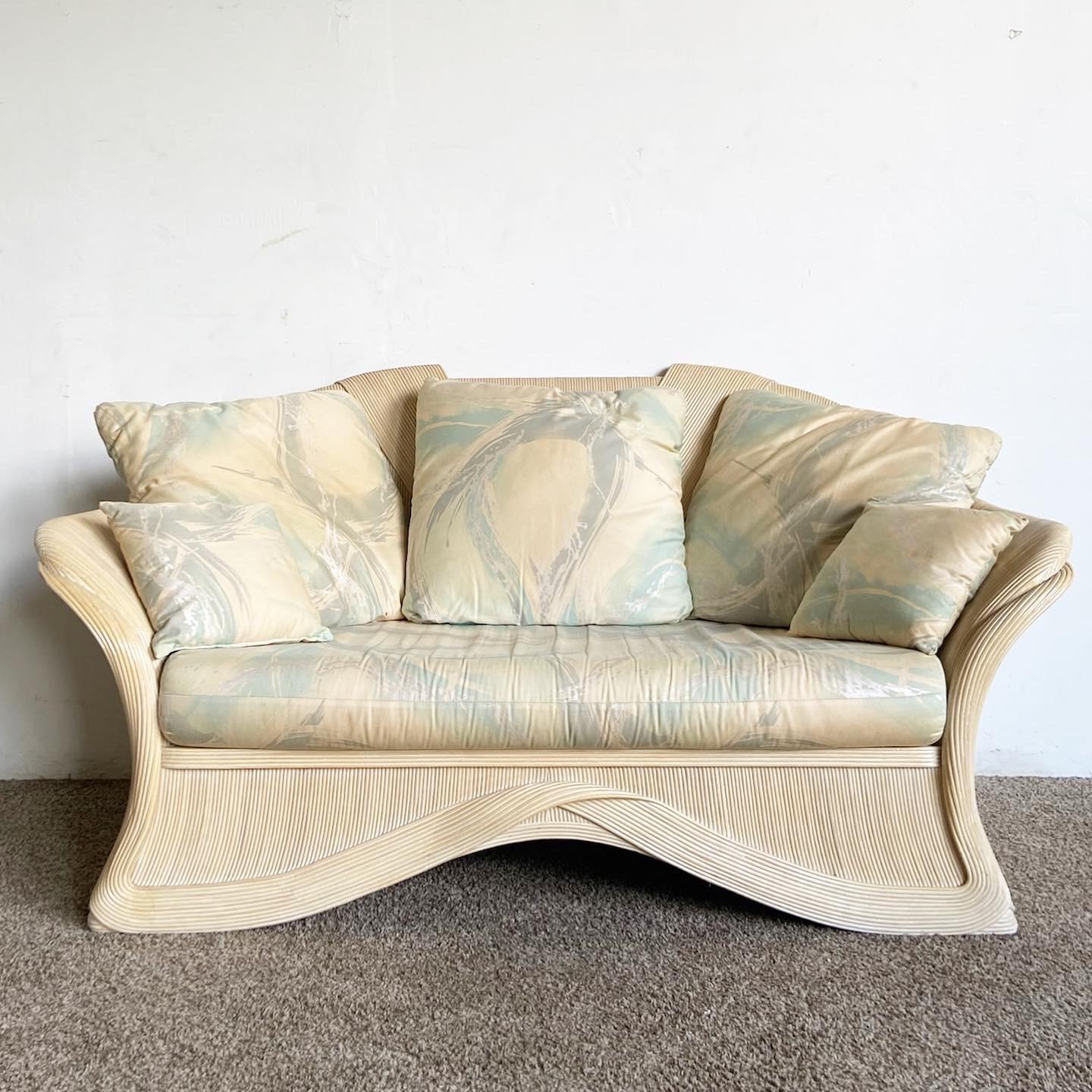 Our Boho Chic Sculpted Pencil Reed Ribbon Loveseat Sofa combines comfort and style. Its unique pencil reed design and plush cushions provide a perfect boho touch to any space.

Boho Chic design for a unique style.
Sculpted Pencil Reed Ribbon for