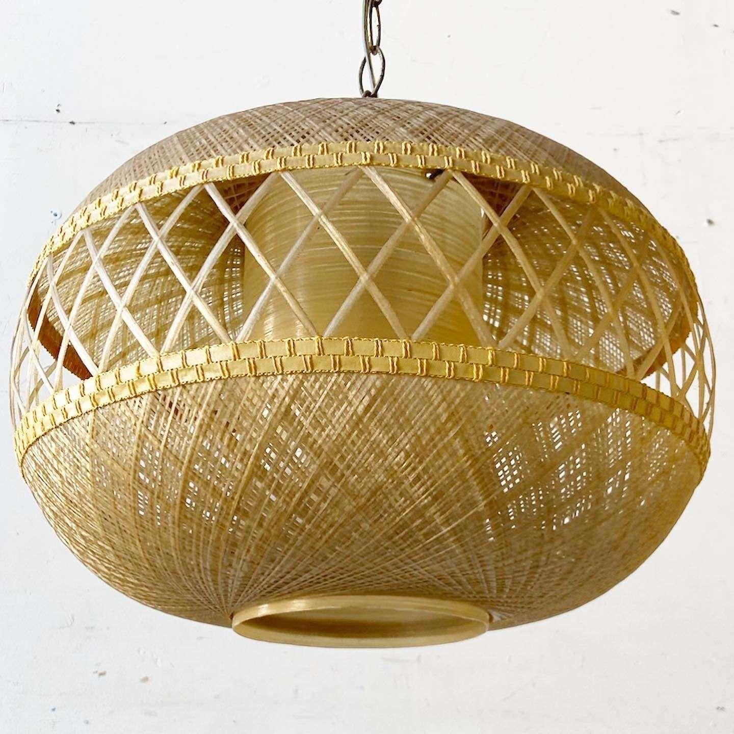 Exceptional vintage boho chic spun fiberglass pendant lamp. Features a fantastic woven design.
