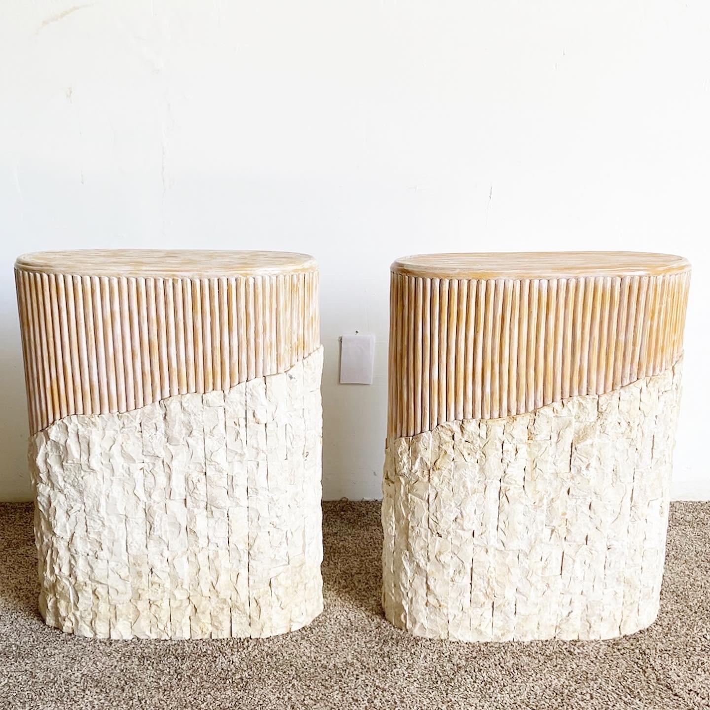 Exceptional vintage postmodern/boho chic pedestals. Features a tessellated stone base with a split reed upper half.