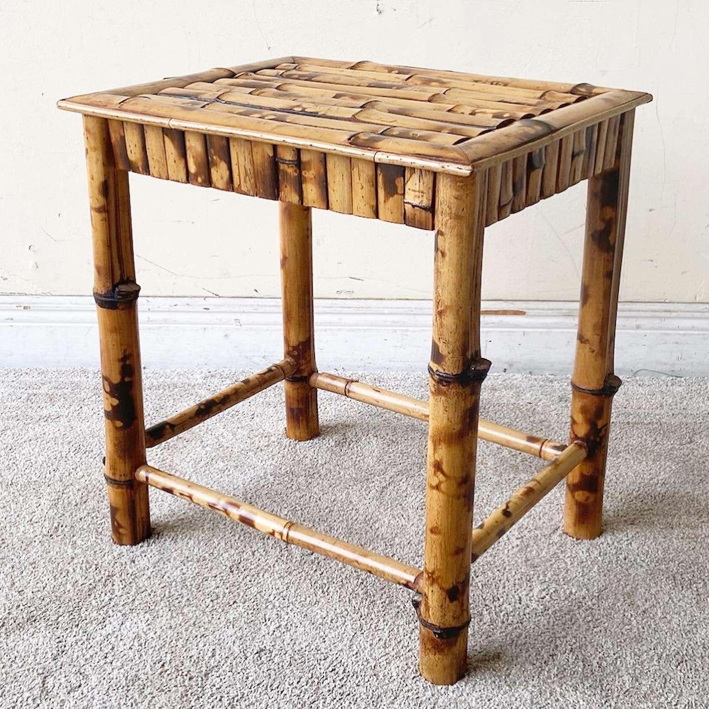 Exceptional vintage bohemian site table. Features a tortoise shell bamboo construction.