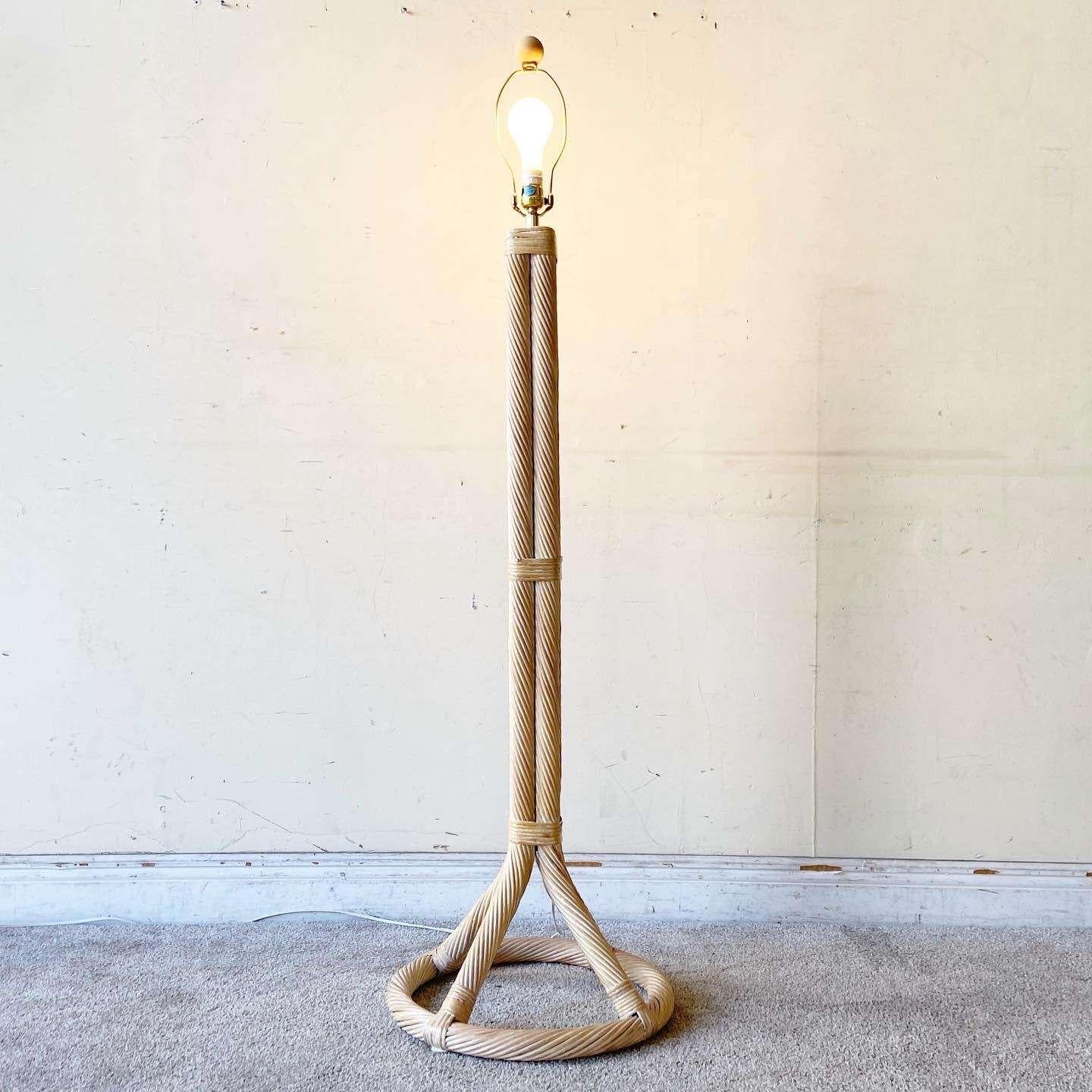 Wonderful vintage bohemian twisted pencil reed floor lamp. Features an incredible white washed finish.