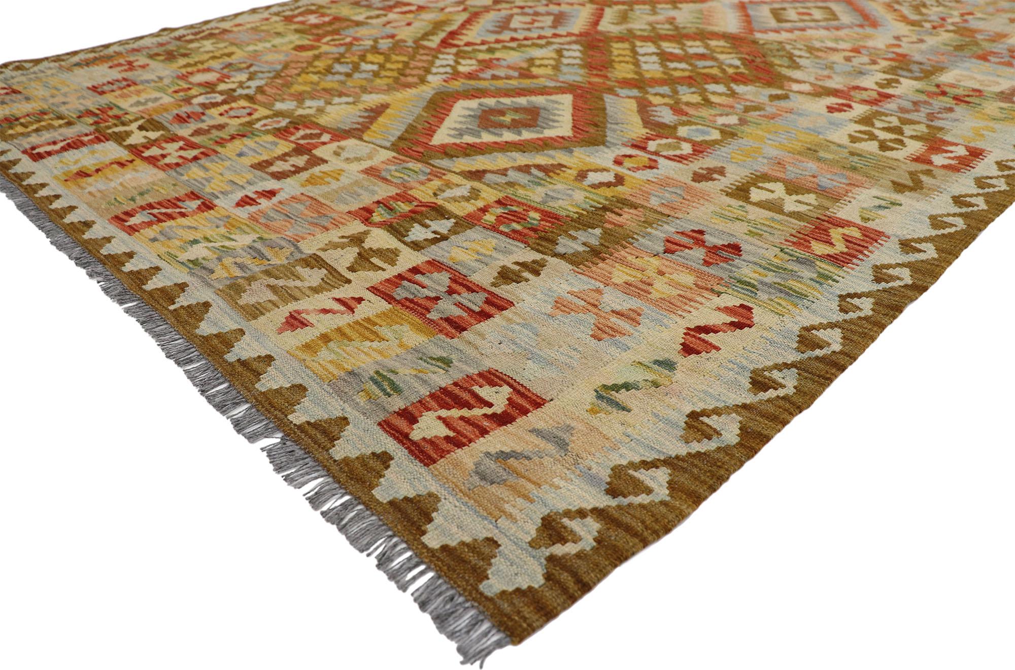 80165 Vintage Afghani Kilim rug, 06'00 x 08'02. Full of tiny details and nomadic charm, this handwoven wool vintage Afghan kilim rug is a captivating vision of woven beauty. The eye-catching tribal design and vibrant earth-tone colors woven into