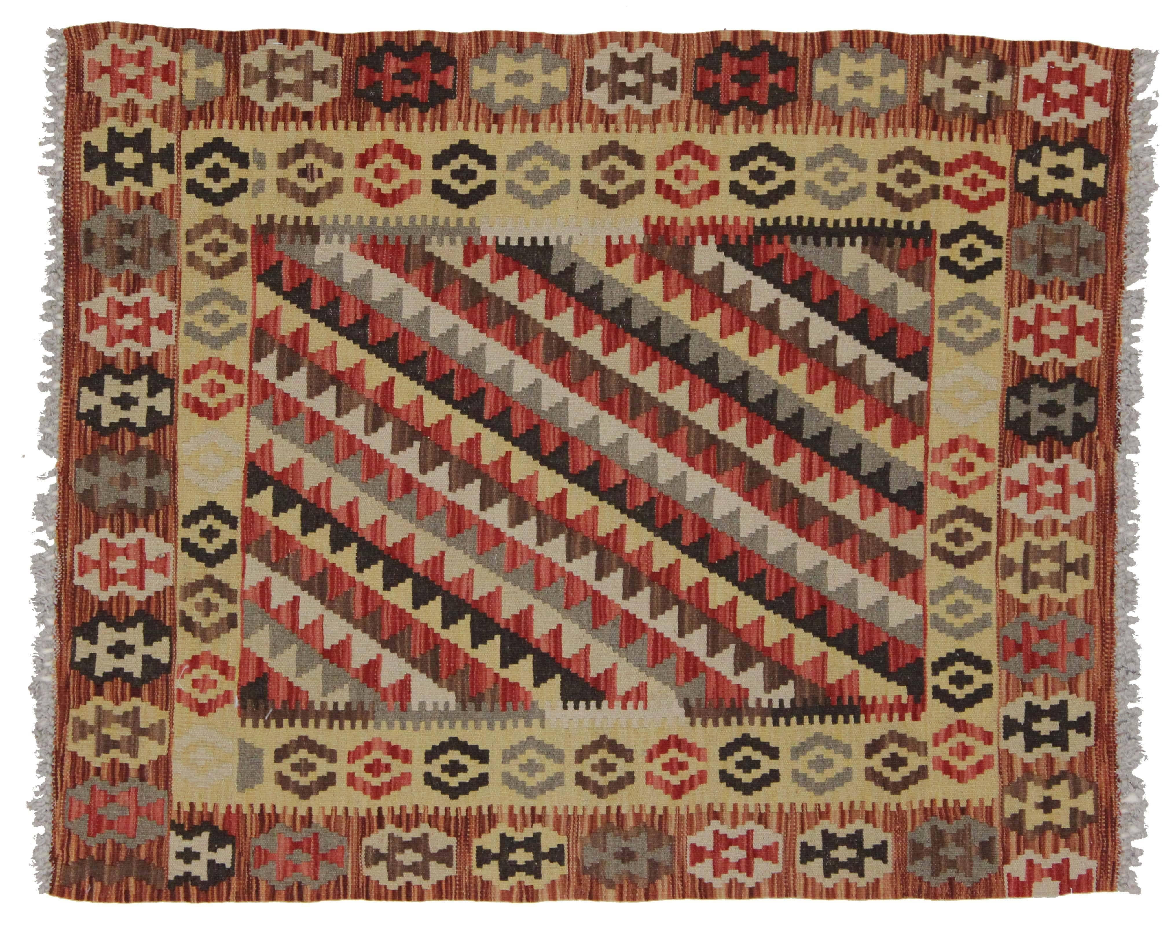 80133, a boho chic vintage Afghani Shirvan kilim rug with tribal style. This handwoven wool vintage Shirvan kilim rug features a central field of inverted triangles in a jeweled palette, diagonal lines create an eye-catching visual. The compound