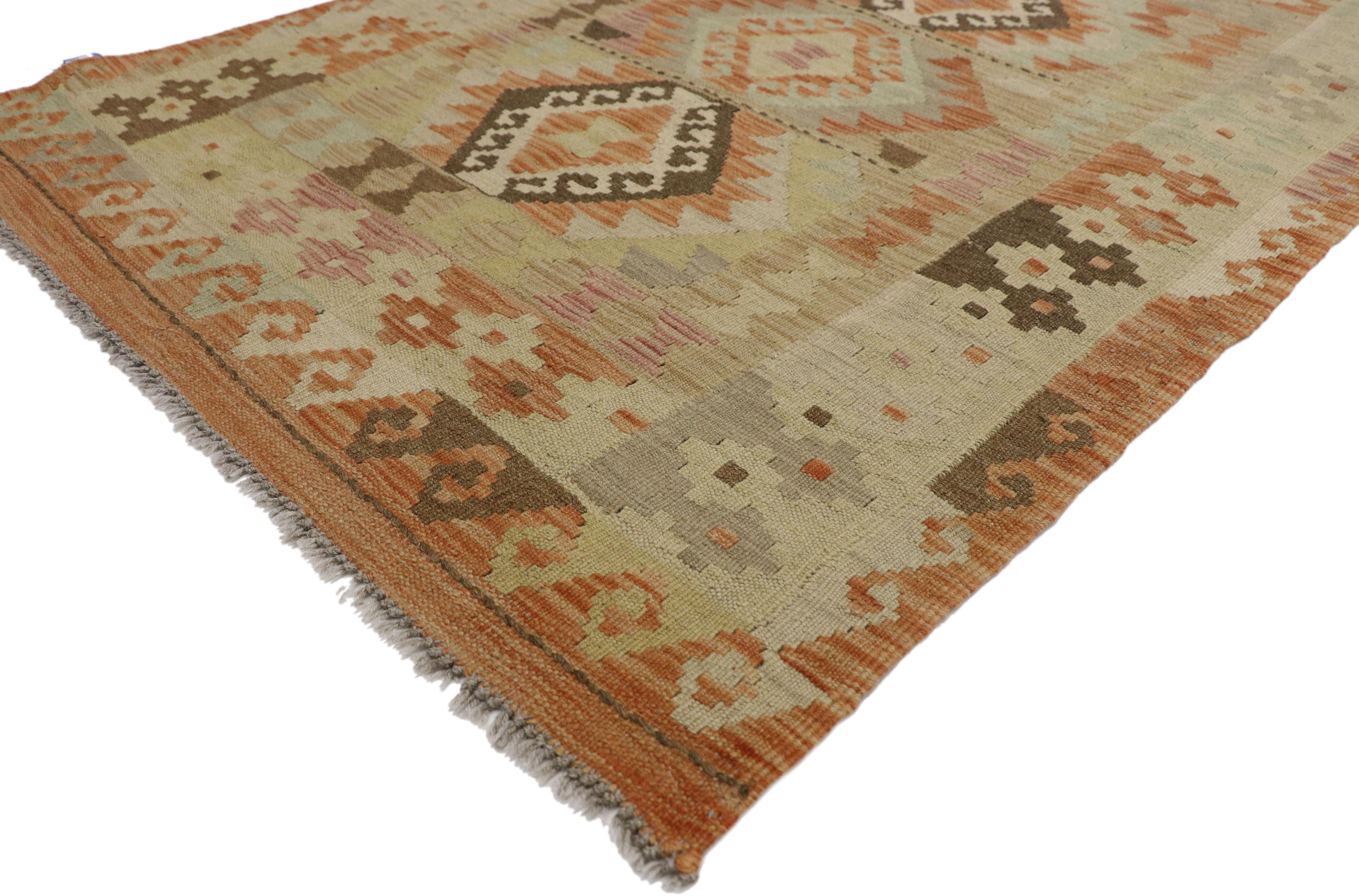 80140, boho chic vintage Afghani Shirvan kilim rug with tribal style. This handwoven wool Shirvan kilim rug features three hexagonal medallions in the style of Turkish guls. The interior field is lined with cruciform figures and a band patterned