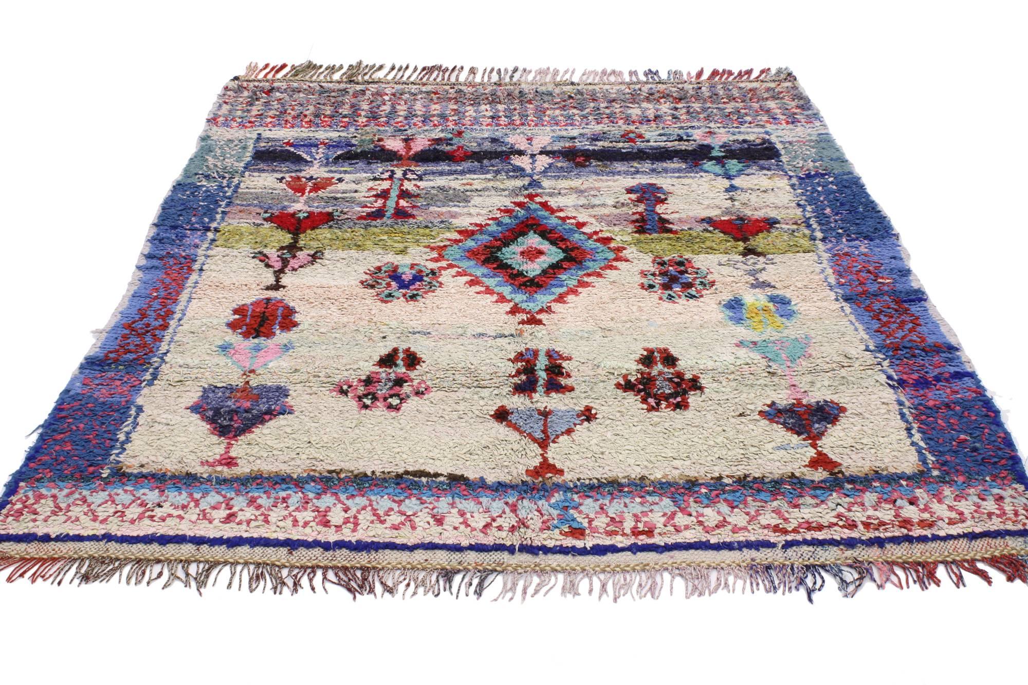 20492 vintage Berber Moroccan Boucherouite rug 04'10 x 05'04. The tribal style and unique hues of this vintage Berber Moroccan Boucherouite rug are a change of pace from the vivacious colors typically associated with Moroccan culture, creating a