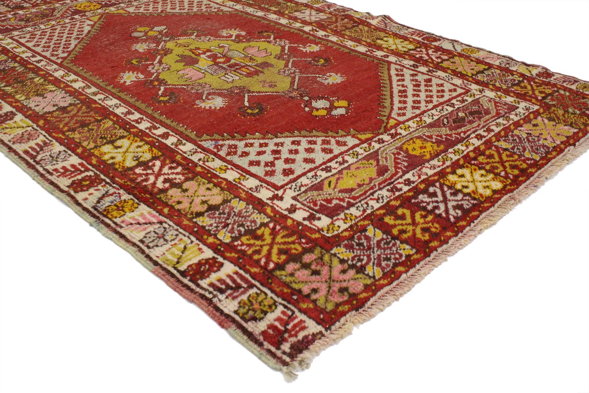 52091 Vintage Turkish Oushak Rug, 03'05 x 05'02.
Providing elements of wanderlust and functional versatility, this hand-knotted wool vintage Turkish Oushak rug with modern style features an open red field with a yellow-green center medallion filled