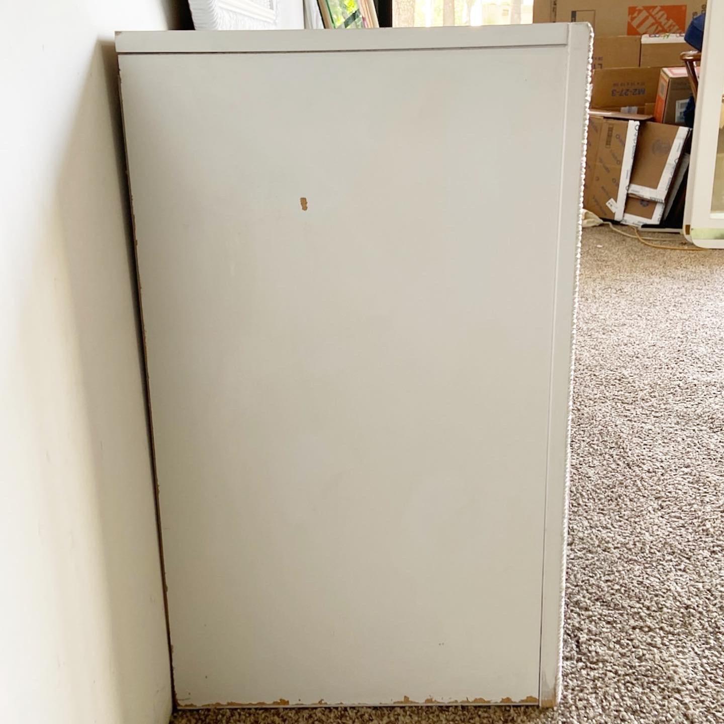 white wicker dresser with mirror