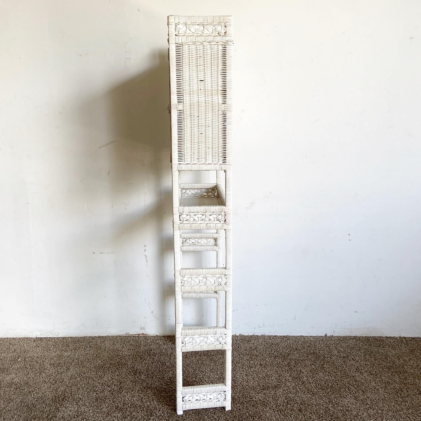 The Boho Chic White Rattan and Wicker Bathroom Storage Etagere offers an ideal storage solution while bringing a touch of bohemian charm to your bathroom. Made from sturdy wicker and natural rattan, this etagere perfectly balances functionality with
