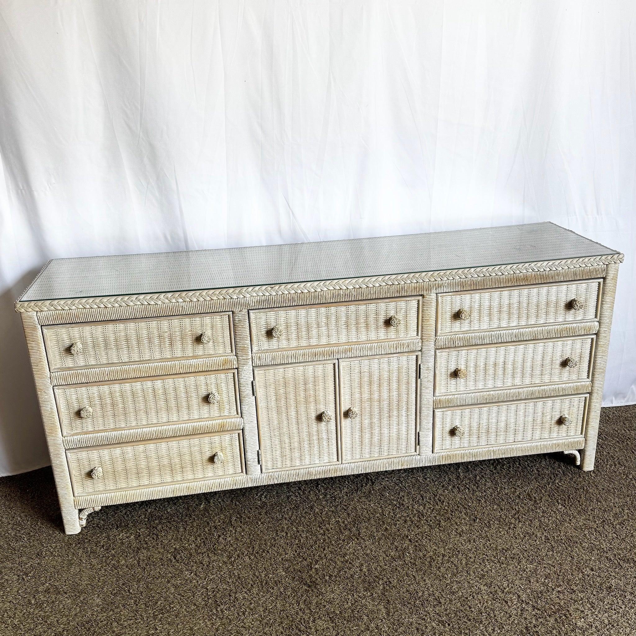 Enhance interiors with this Boho Chic Wicker Dresser—vintage Henry Link texture, six drawers, and glass‑topped sophistication.
 
 Minor wear as shown in the photos.
 
 We sell items as acquired, without restoring or repairing. Vintage pieces may