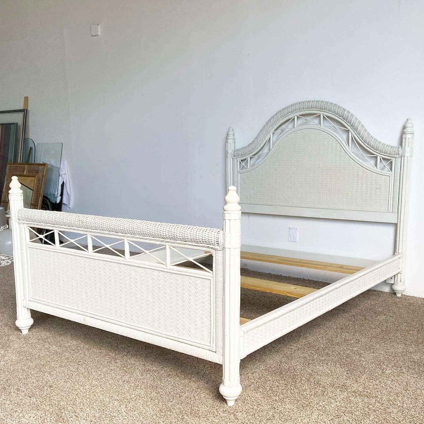 Exceptional vintage boho chic queen size bed frame with headboard, side rails and foot board. Constructed with bamboo rattan and herringbone weaving through the surfaces.

Footboard measures 38”H