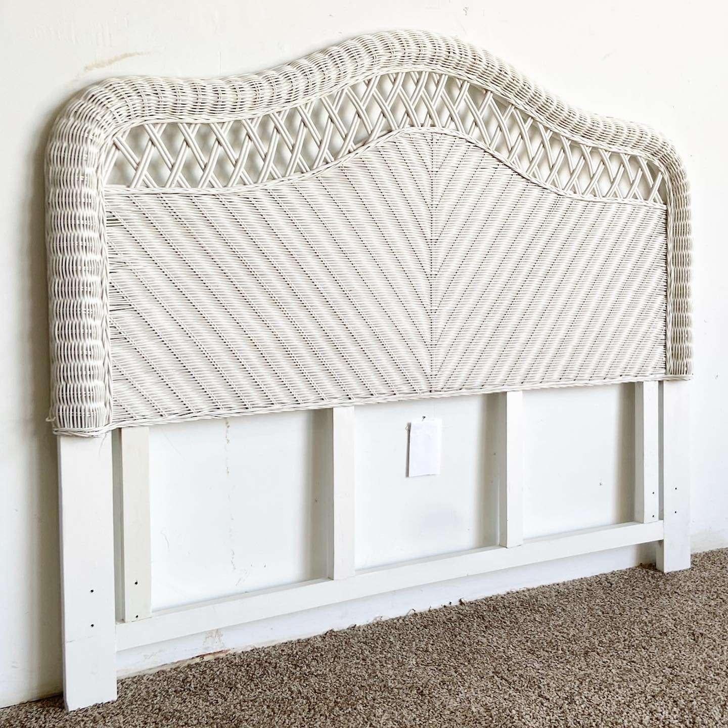 Exceptional vintage boho chic queen size headboard. Features an ornate wicker frame.