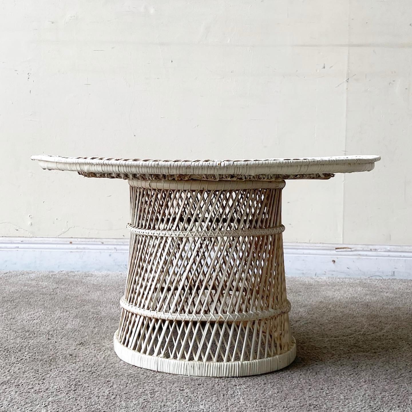 Incredible boho chic wicker and rattan coffee table. Features a fabulous woven design with a circular glass top.

Additional information:
Material: Rattan, Wicker
Color: White
Style: Boho Chic
Time Period: 1980s
Dimension: 30.5