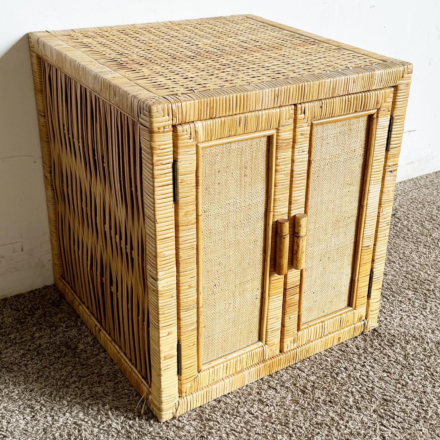 Discover the Boho Chic Wicker and Rattan Cubic Cabinet, a side table/nightstand that melds functionality with an organic aesthetic. Its natural textures and cubic design offer bohemian elegance, making it a versatile addition to any bedroom or