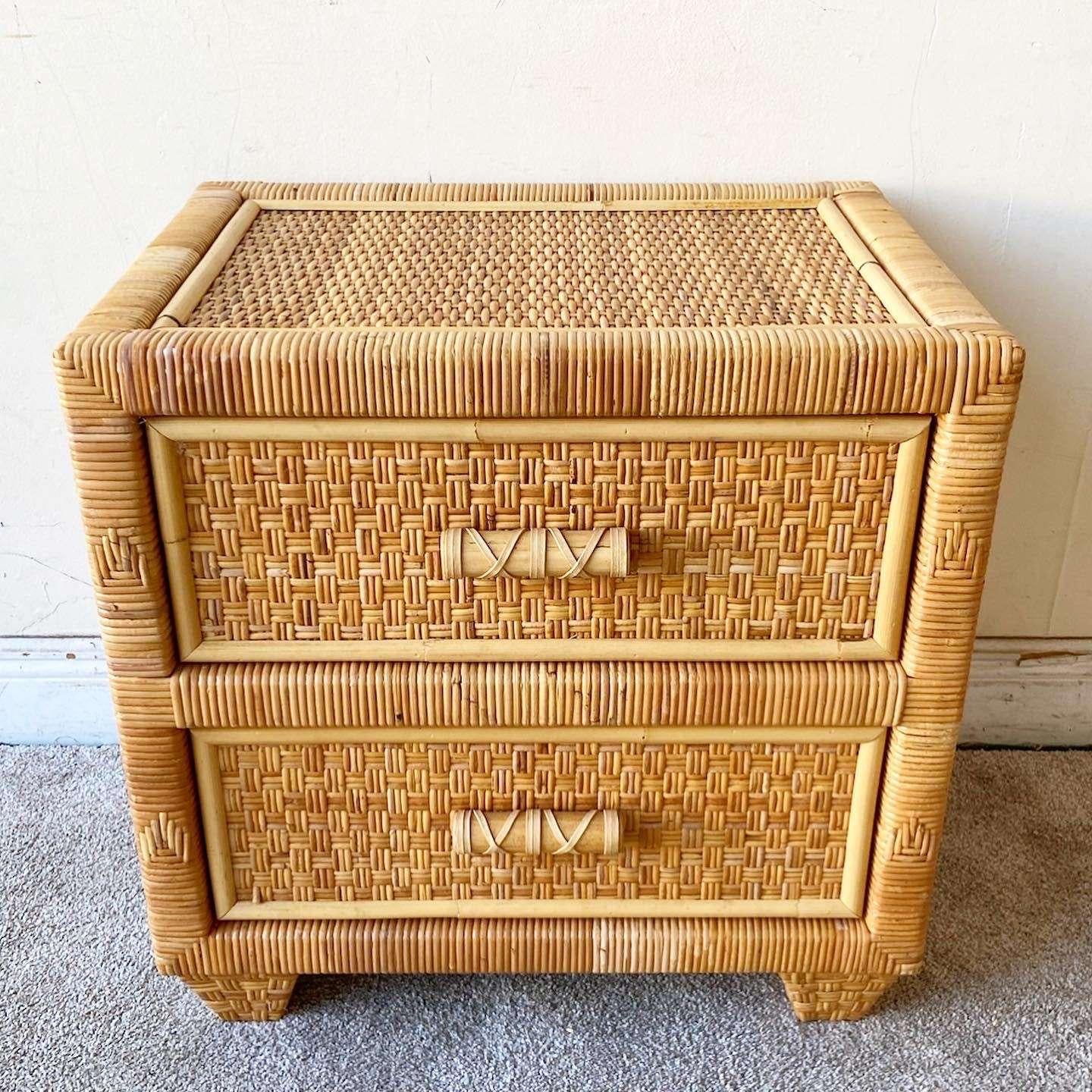 Exceptional vintage bohemian nighstands. Features a rattan frame with wicker paneling.