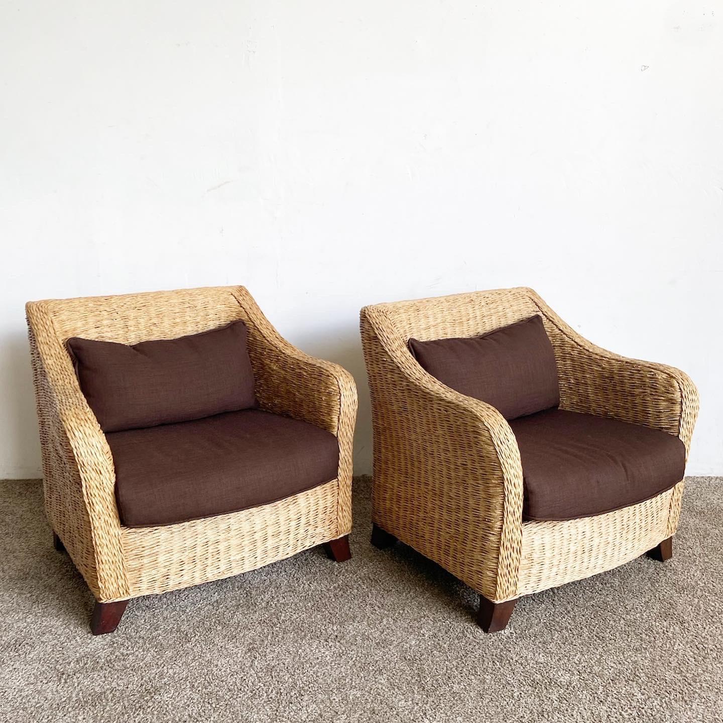 Add a touch of bohemian sophistication with our Boho Chic Wicker Arm Chairs. These handcrafted pieces, with resilient wicker construction and comfortable deep brown cushions, infuse any setting with natural warmth.

Handcrafted wicker construction