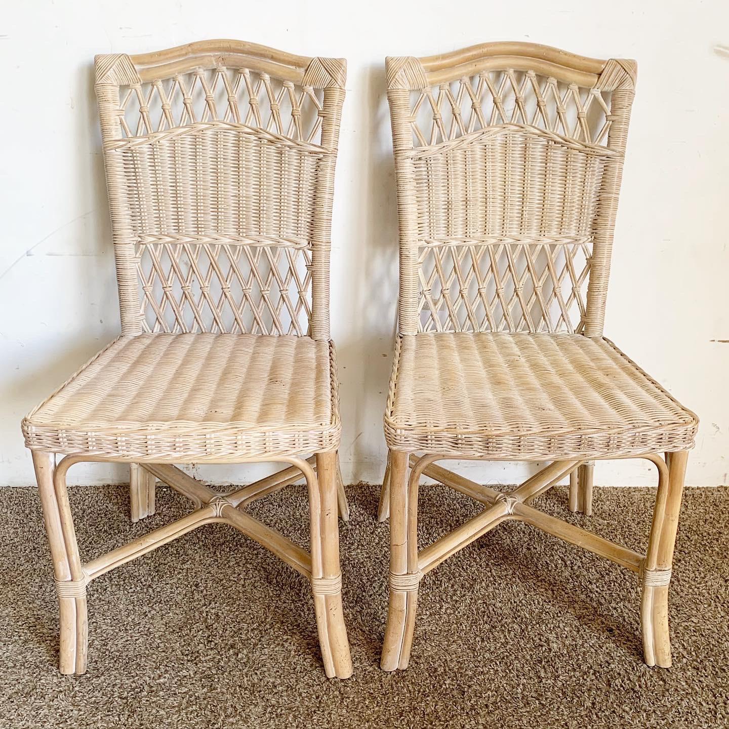 Elevate your dining experience with the Boho Chic Wicker Bamboo Rattan Dining Chairs. This set of four chairs, crafted from wicker, bamboo, and rattan, offers a nature-infused elegance. Their interwoven design exudes warmth and texture, blending