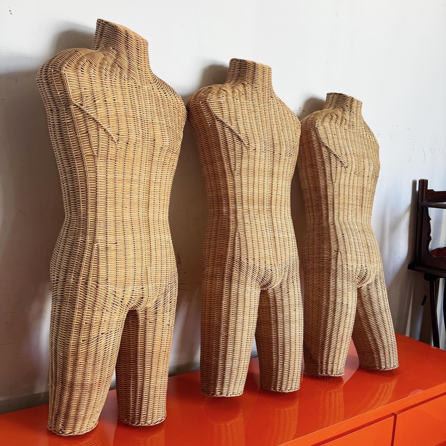 Add a distinctive touch to your decor with this set of 3 Boho Chic Wicker Male Mannequin Sculptures. Made from natural wicker, these sculptures offer a rustic yet stylish appeal, each featuring a unique pose that injects personality and whimsy into
