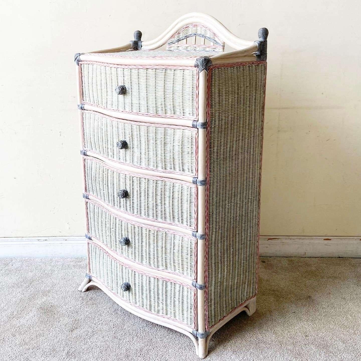 Exceptional vintage boho chic bamboo rattan and wicker Highboy dresser. Features an off white and pink finish with kindred gray accents and 5 spacious drawers.
