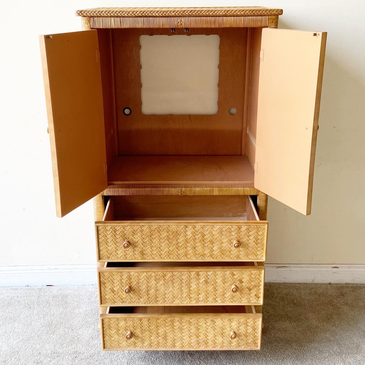 Amazing boho chic wicker and rattan armoire. Features three spacious drawers and a shelves section.
 