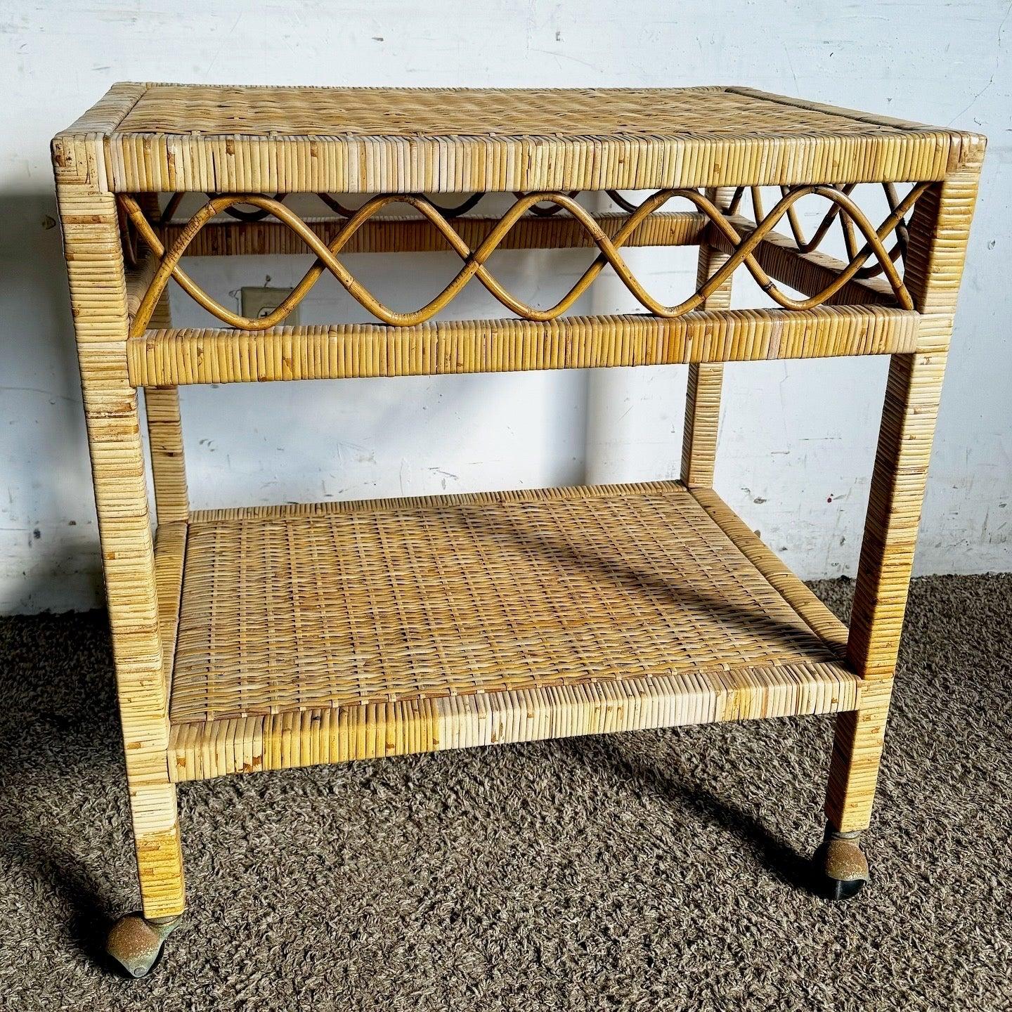 Discover the Boho Chic Wicker Two-Tier Cart, featuring natural wicker and a two-tier design, perfect for serving or displaying decor.
 
 We sell items as acquired, without restoring or repairing. Vintage pieces may have age-related wear. Review