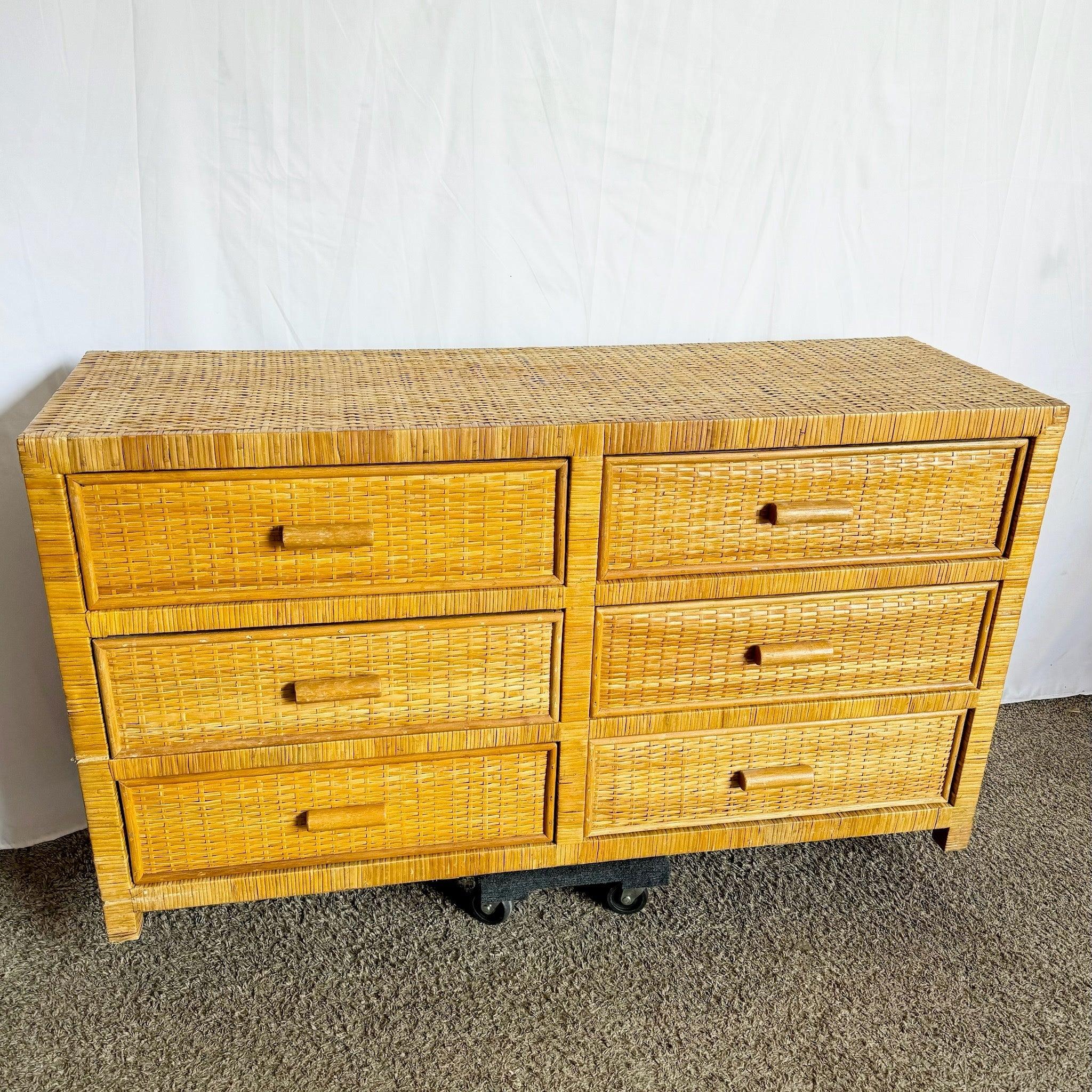 Boho Chic Wicker Wrapped Dresser with six drawers and natural finish—adds relaxed sophistication to any room.​
 
 Some wear to the wicker around the base and edges as shown in the photos. 
 
 We sell items as acquired, without restoring or